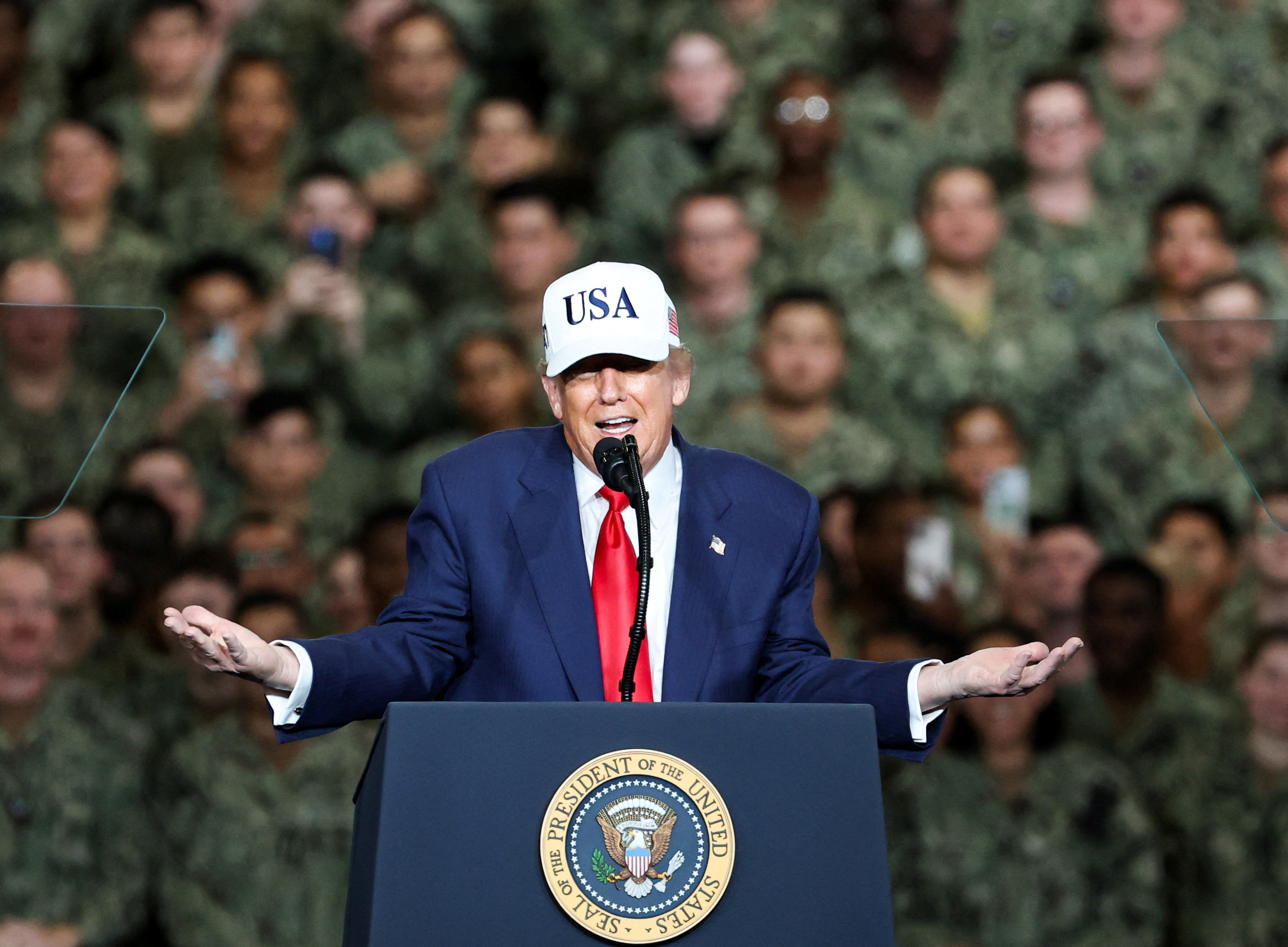 US President Donald Trump makes a speech to members of the US Navy.
