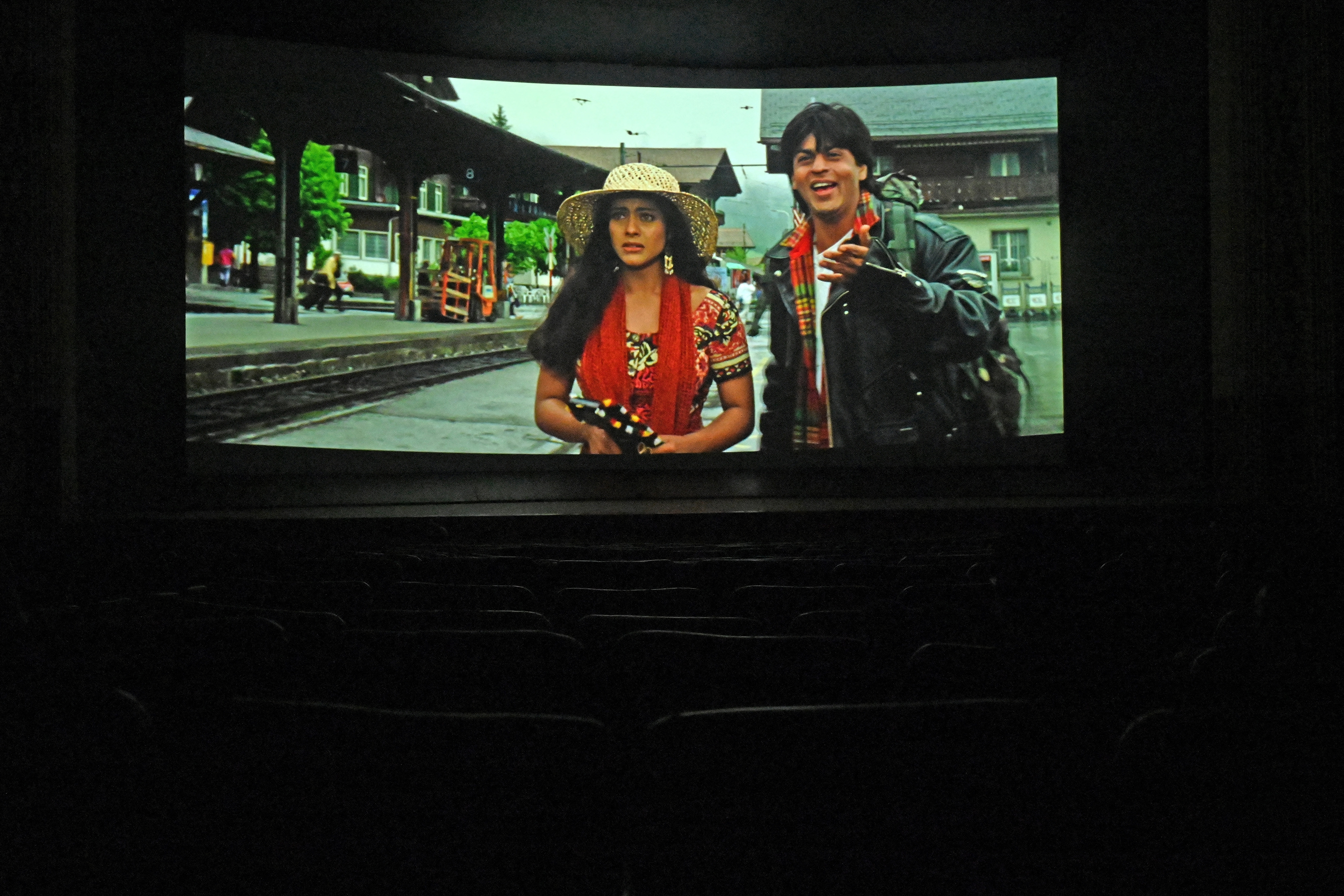 an iconic scene is seen during the screening of the popular Bollywood Hindi film 'Dilwale Dulhania Le Jayenge'