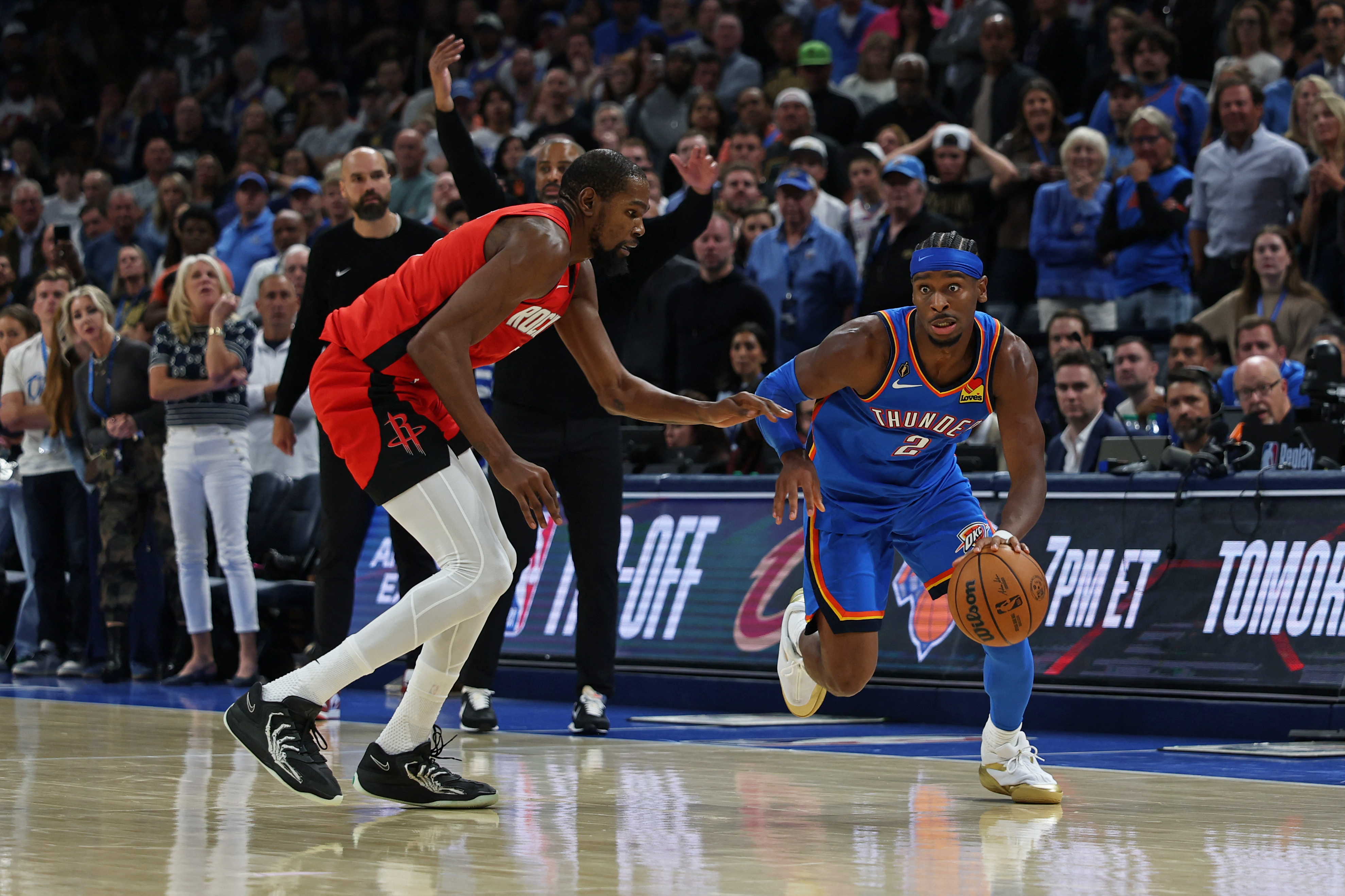 Kevin Durant and Shai Gilgeous-Alexander in action.