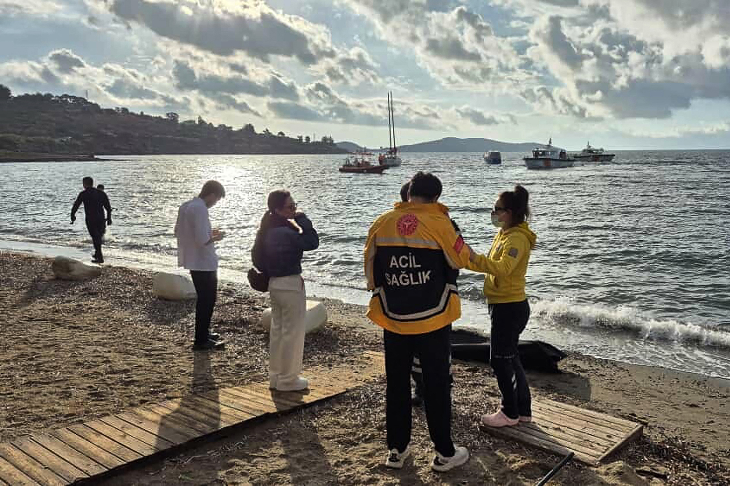 Turkish emergency officials after sinking of refugee boat that killed at least 14