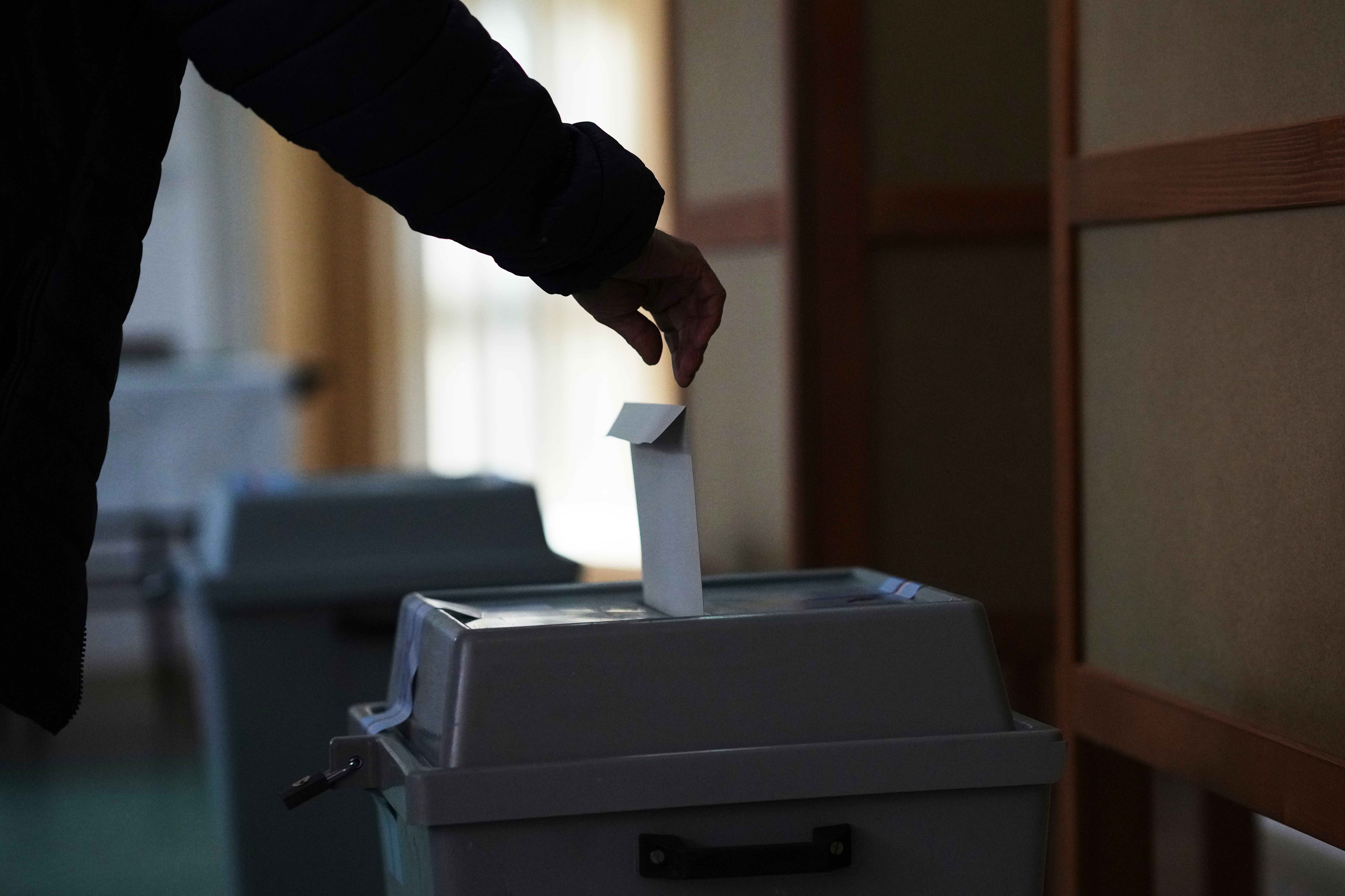 A man casts his ballot in the general election at a polling station in Ostrava, Czech Republic on October 3, 2025.