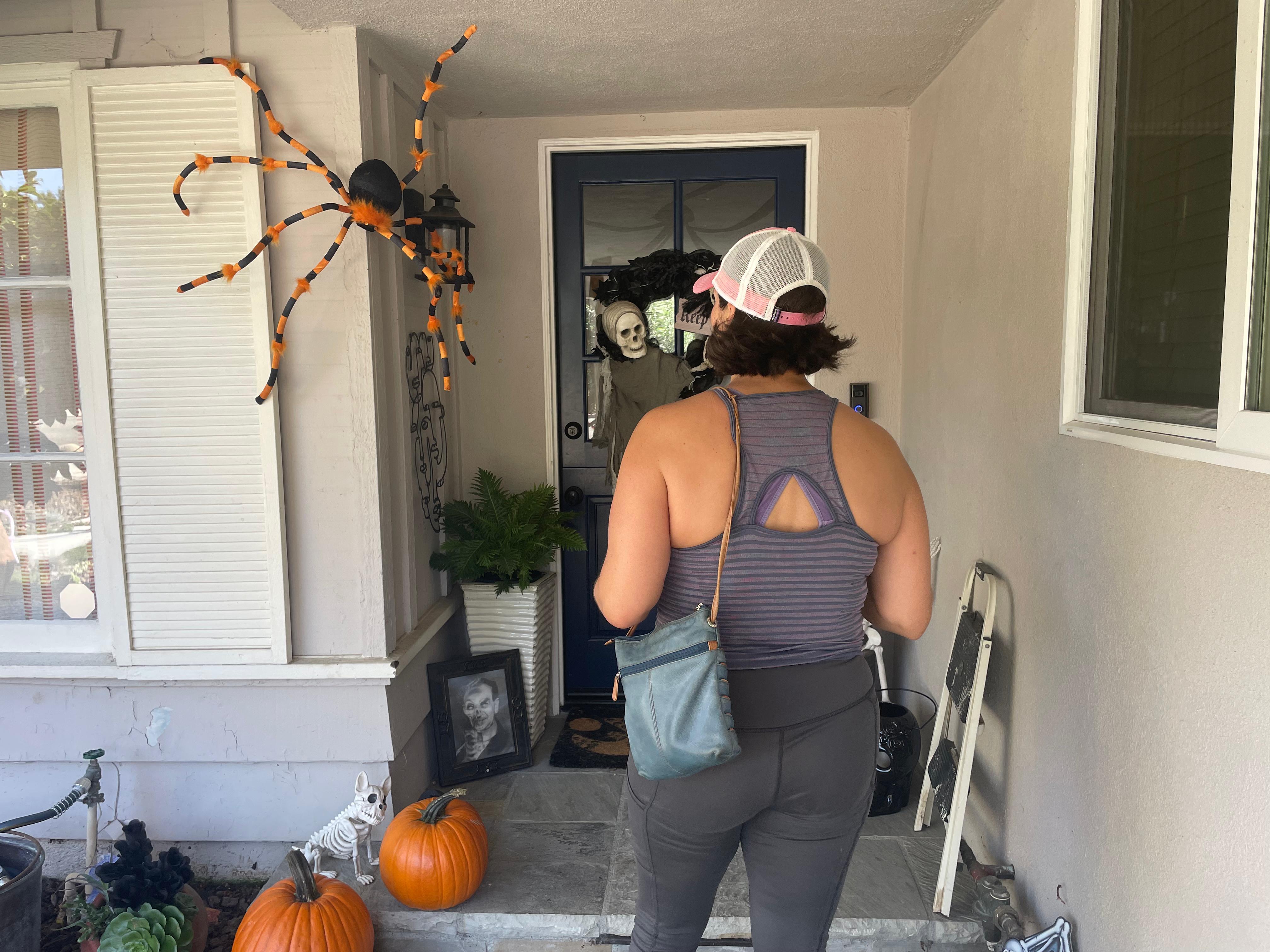 A volunteer knocks doors