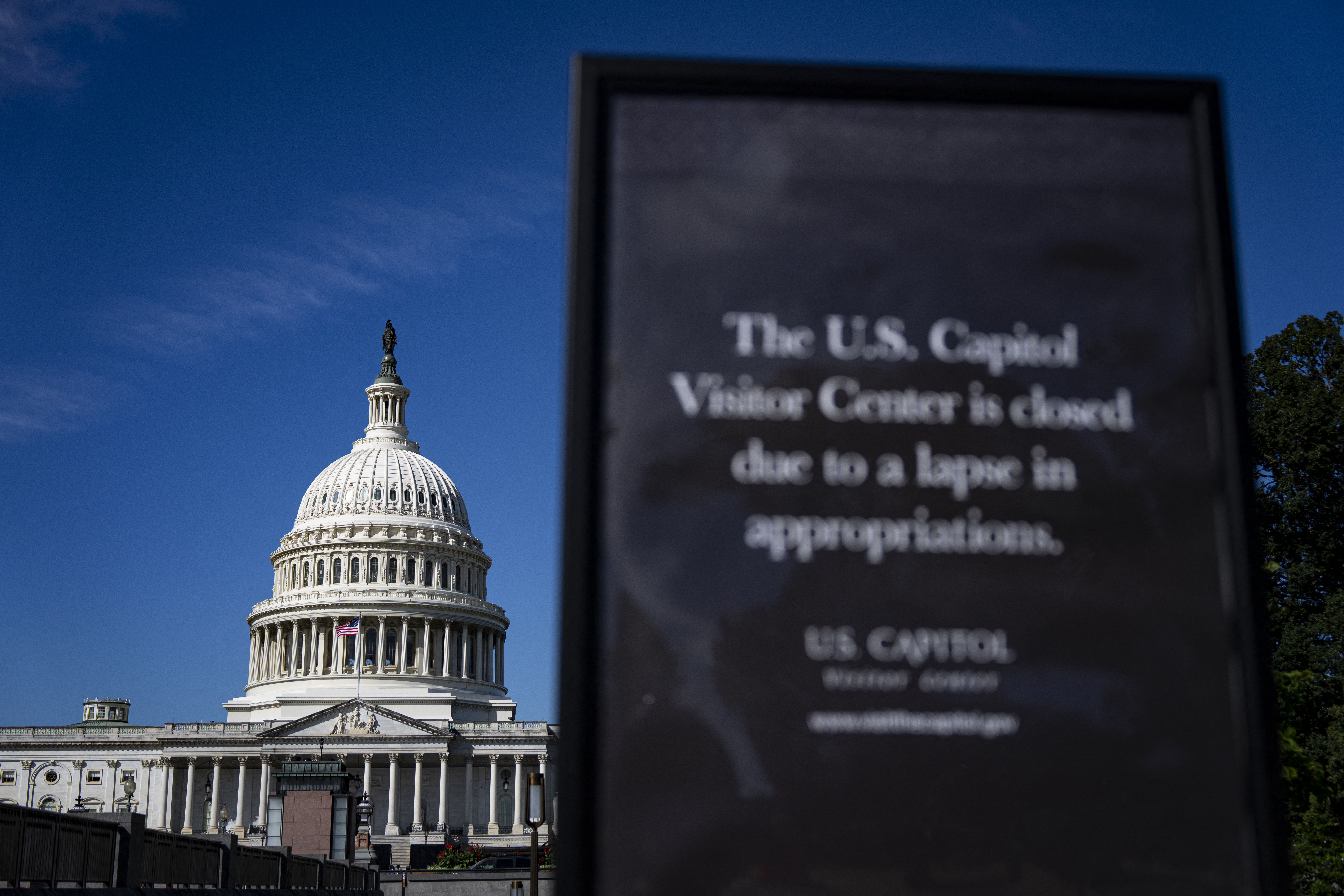 WASHINGTON, DC - OCTOBER 1: A sign indicating that the U.S. Capitol Visitor Center is closed due to the government shutdown, on October 1, 2025 in Washington, DC. Congress could not agree on a budget to fund government at midnight, causing the first shutdown since 2018 [File: Al Drago/Getty Images/AFP]