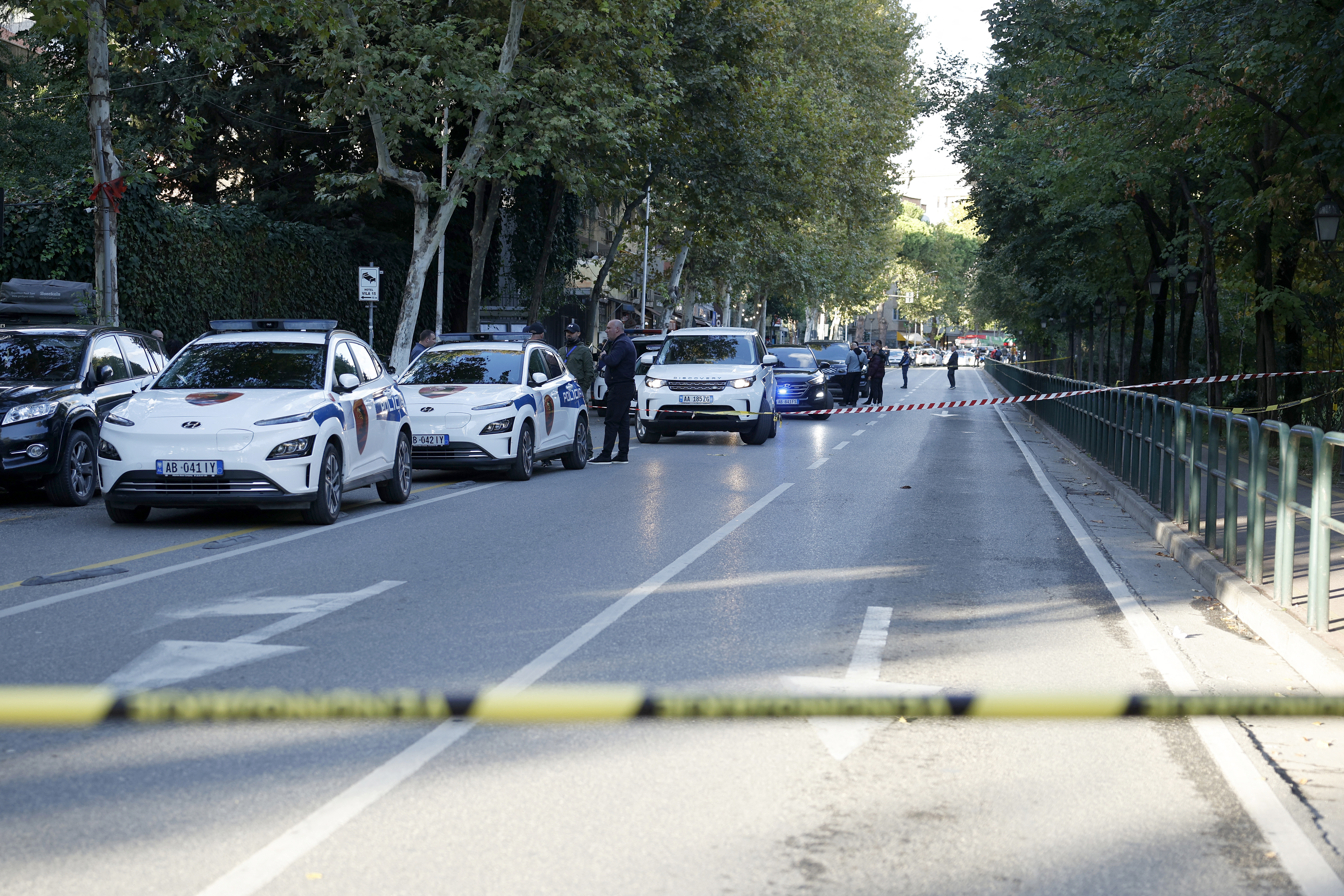 Police secure the perimeter outside Tirana Appeal Court after a judge was shot dead, in Tirana, on October 6, 2025.
