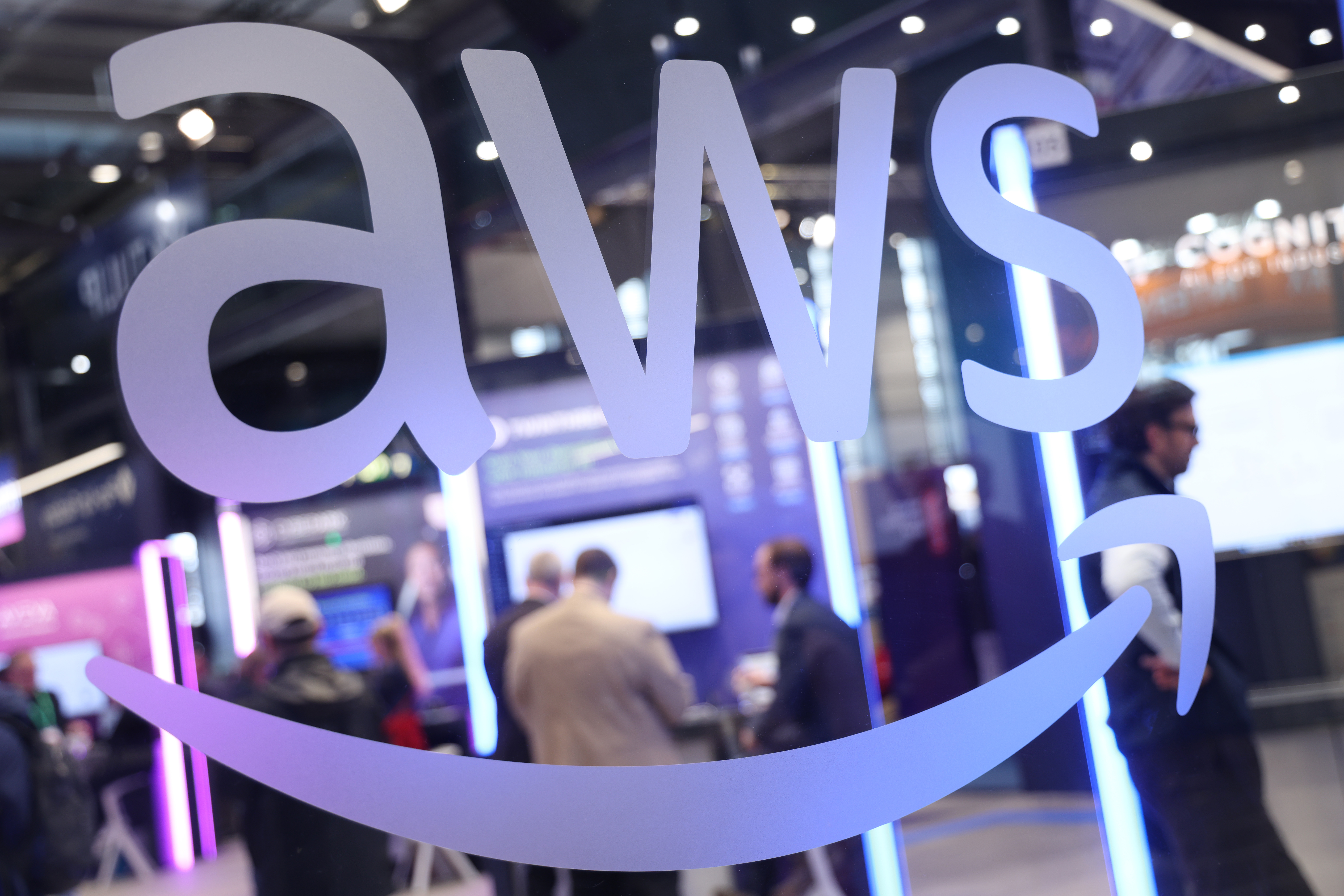 Amazon Web Services pavilion stands are seen at a fair.