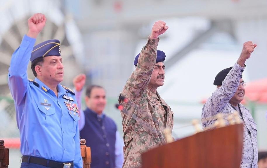 Field Marshal Asim Munir (centre) is flanked by Chief of the Air Staff Air Chief Marshal Zaheer Ahmad Baber Sidhu (left) and Chief of the Naval Staff Admiral Naveed Ashraf (right) on May 19, a day before he was awarded the five-star rank by the government [Handout/Inter-Services Public Relations]