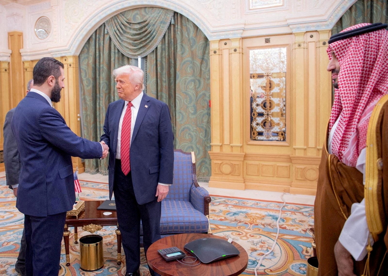 U.S. President Donald Trump meets Syrian President Ahmed al-Sharaa in Riyadh, Saudi Arabia, in this handout released on May 14, 2025. Saudi Press Agency