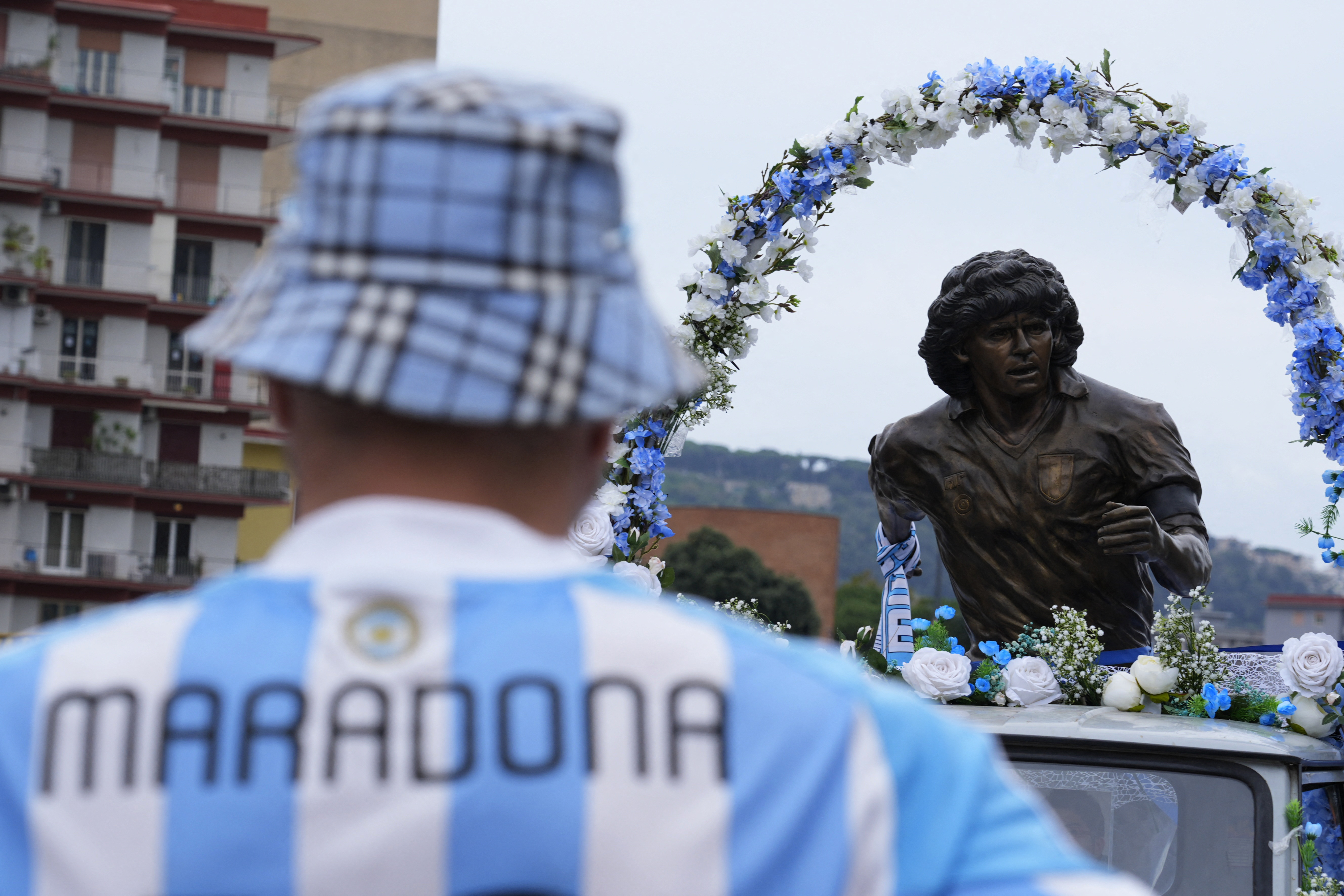 Statue of Diego Maradona tours Naples on 65th birthday of late football legend