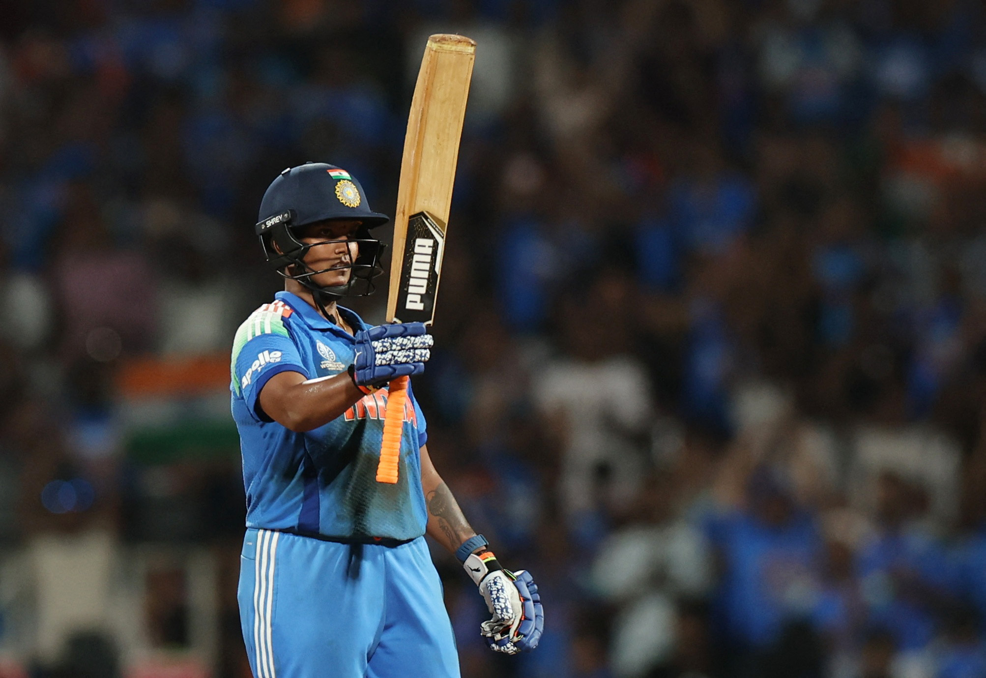 India's Deepti Sharma celebrates after reaching her half century