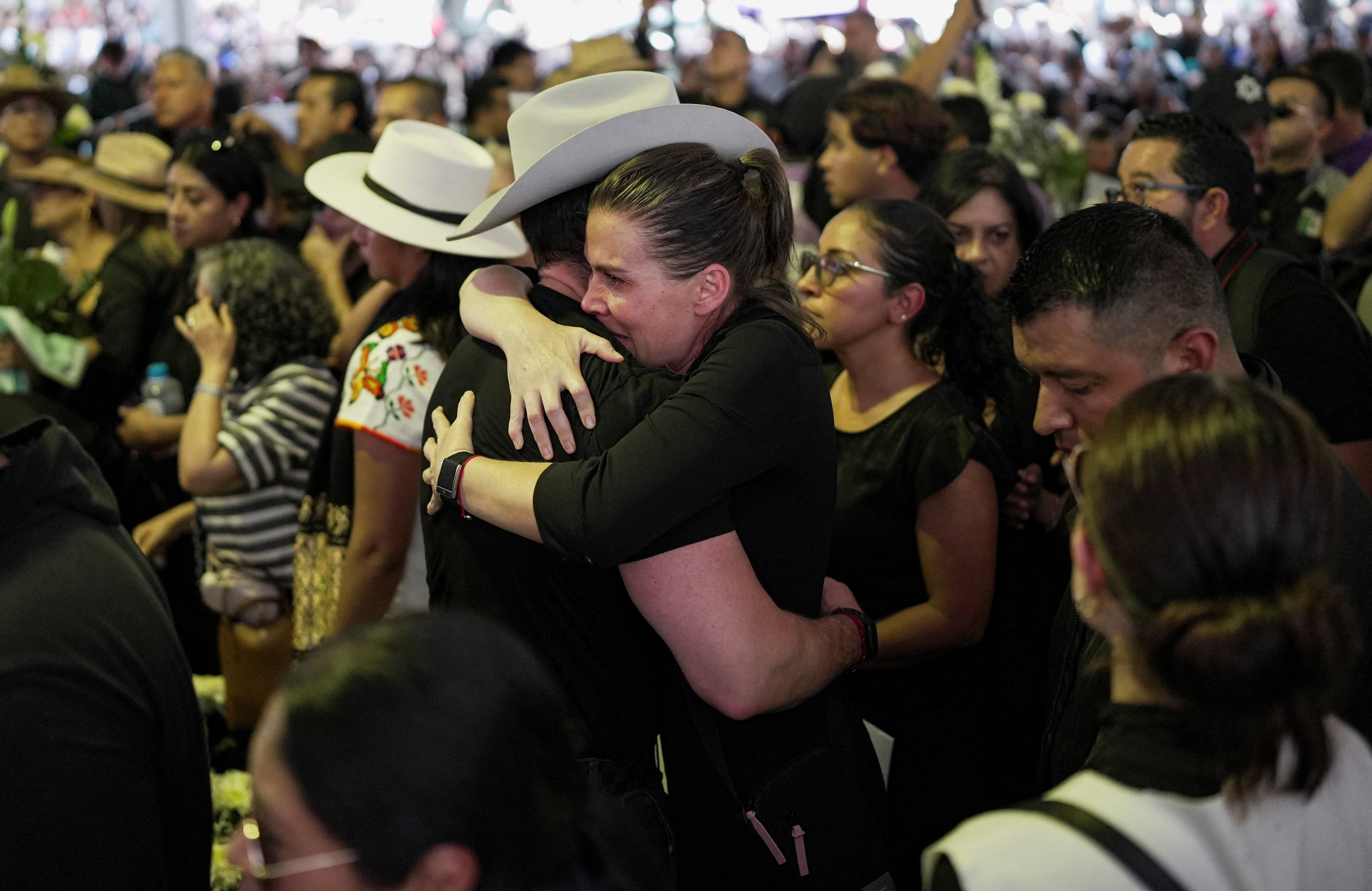 People react during the funeral of Carlos Manzo, the mayor who was shot dead during a Day of the Dead event, in Uruapan, Mexico, November 2, 2025.