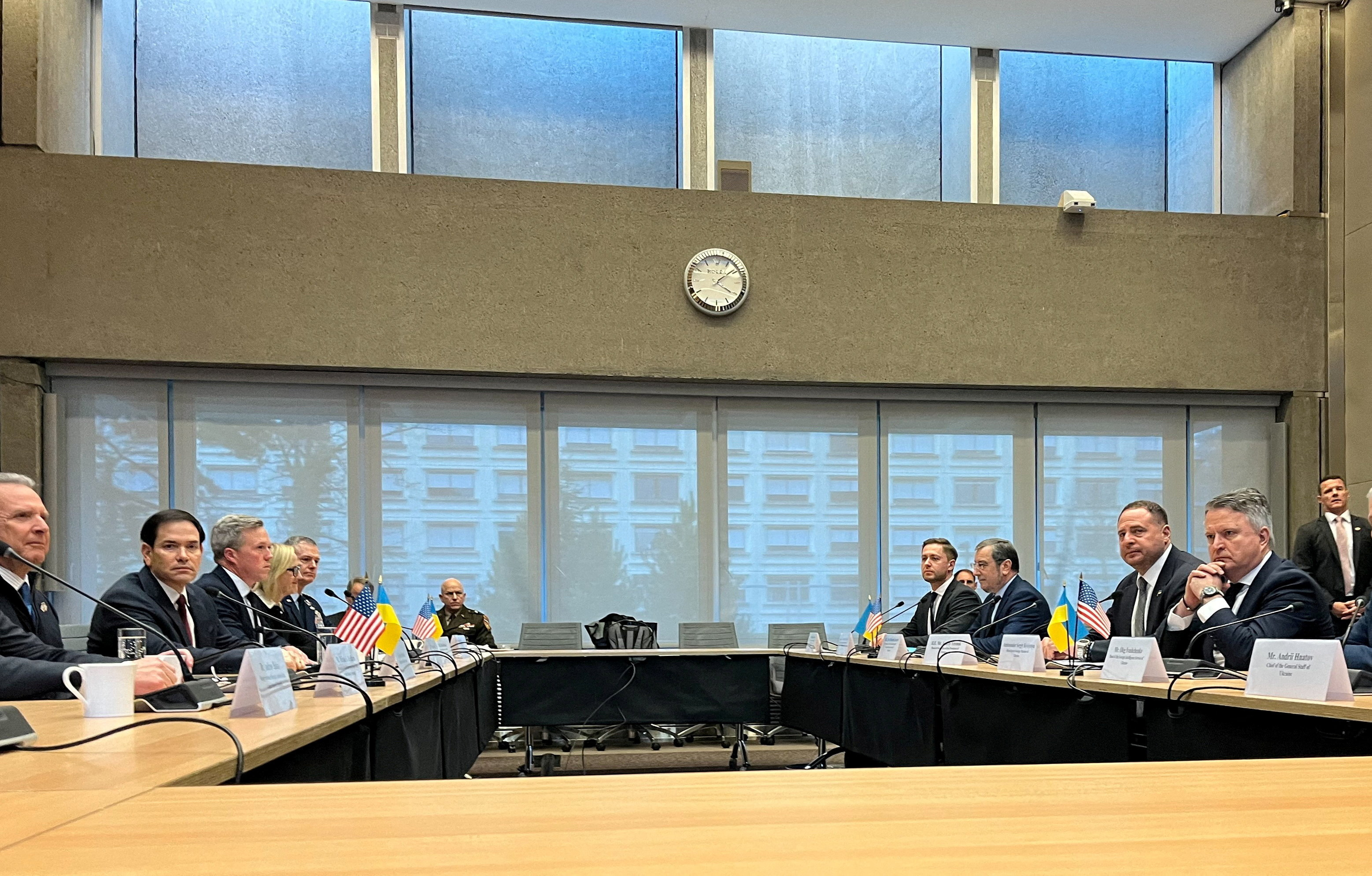 U.S. Special Envoy Steve Witkoff, U.S. Secretary of State Marco Rubio, U.S. Army Secretary Daniel Driscoll and and other members of the U.S. delegation, and Head of the Office of the President of Ukraine Andriy Yermak and other members of the Ukrainian delegation sit before closed-door talks on ending Russia's war in Ukraine, at the U.S. Mission in Geneva, Switzerland, November 23, 2025. REUTERS/Emma Farge TPX IMAGES OF THE DAY