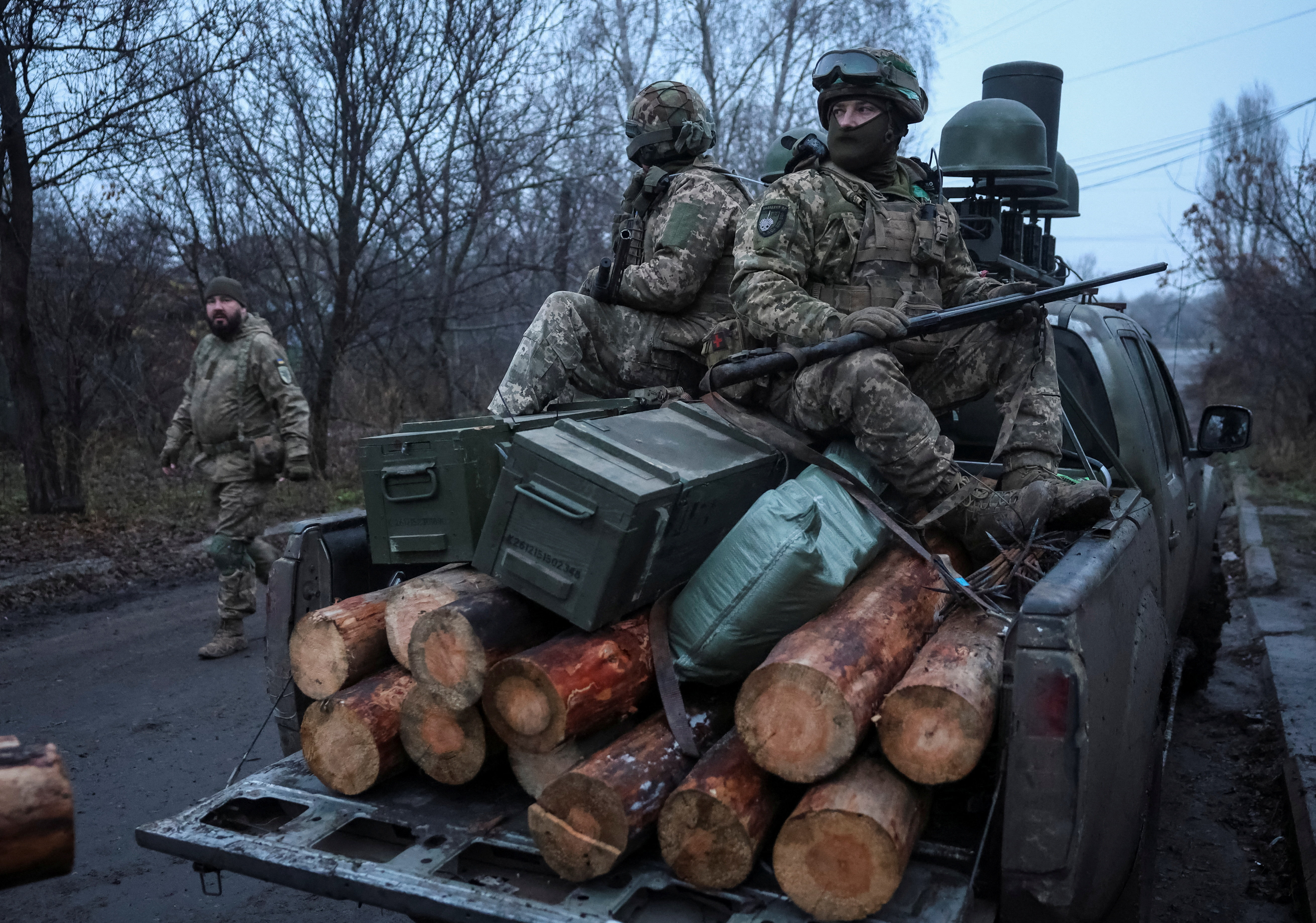 Servicemen of the 93rd Kholodnyi Yar Separate Mechanized Brigade of the Ukrainian Armed Forces ride a pickup truck to a combat mission, amid Russia's attack on Ukraine, near the frontline town of Kostiantynivka in Donetsk region, Ukraine November 27, 2025. REUTERS/Stringer