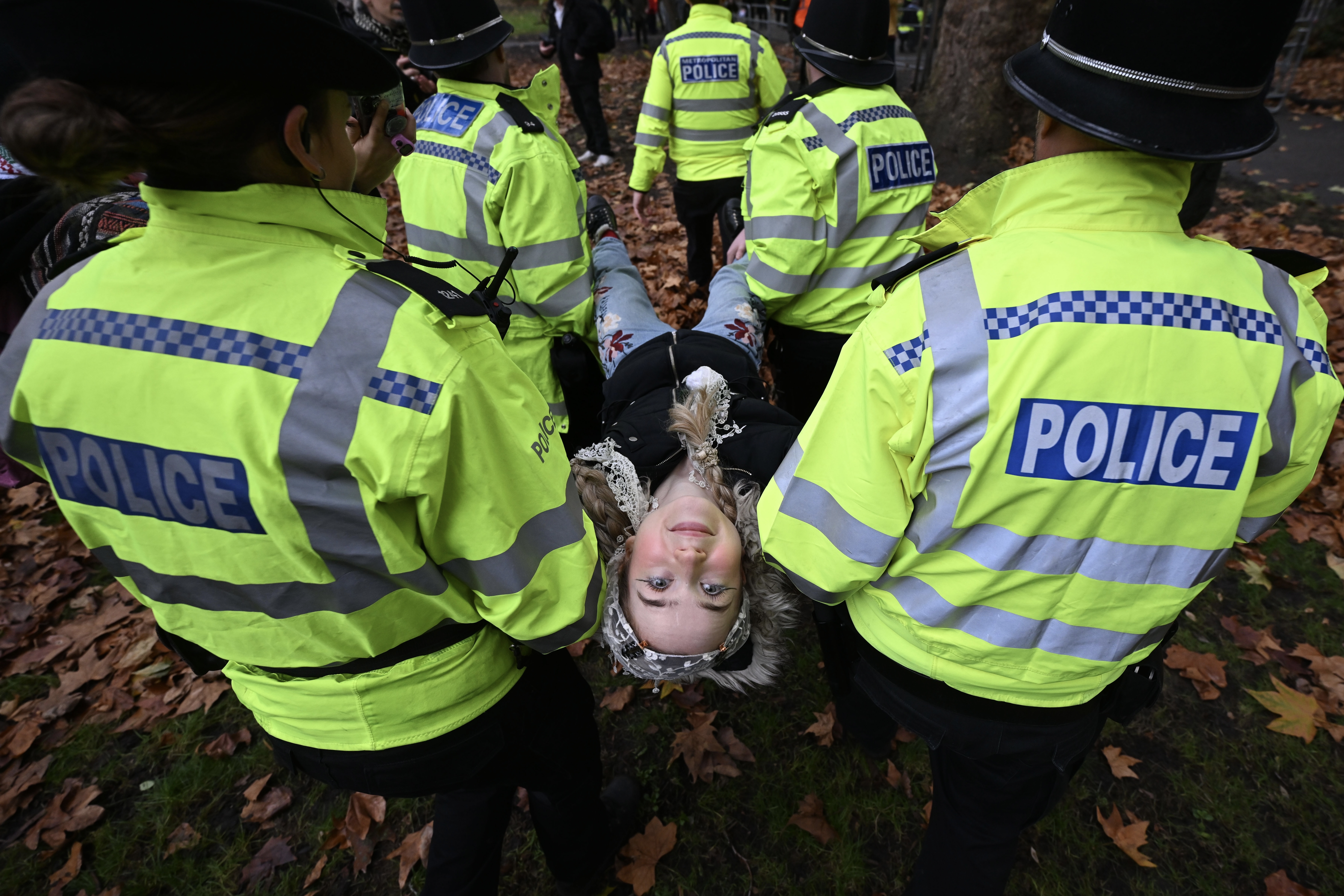 Police officers detain protesters during the "Lift the Ban" demonstration organized by the civil action and campaign group Defend Our Juries ahead of a judicial review into the decision to designate the Palestine Action group as a terrorist organization at Tavistock Square in London, United Kingdom [File: Raşid Necati Aslım/ Anadolu Agency]