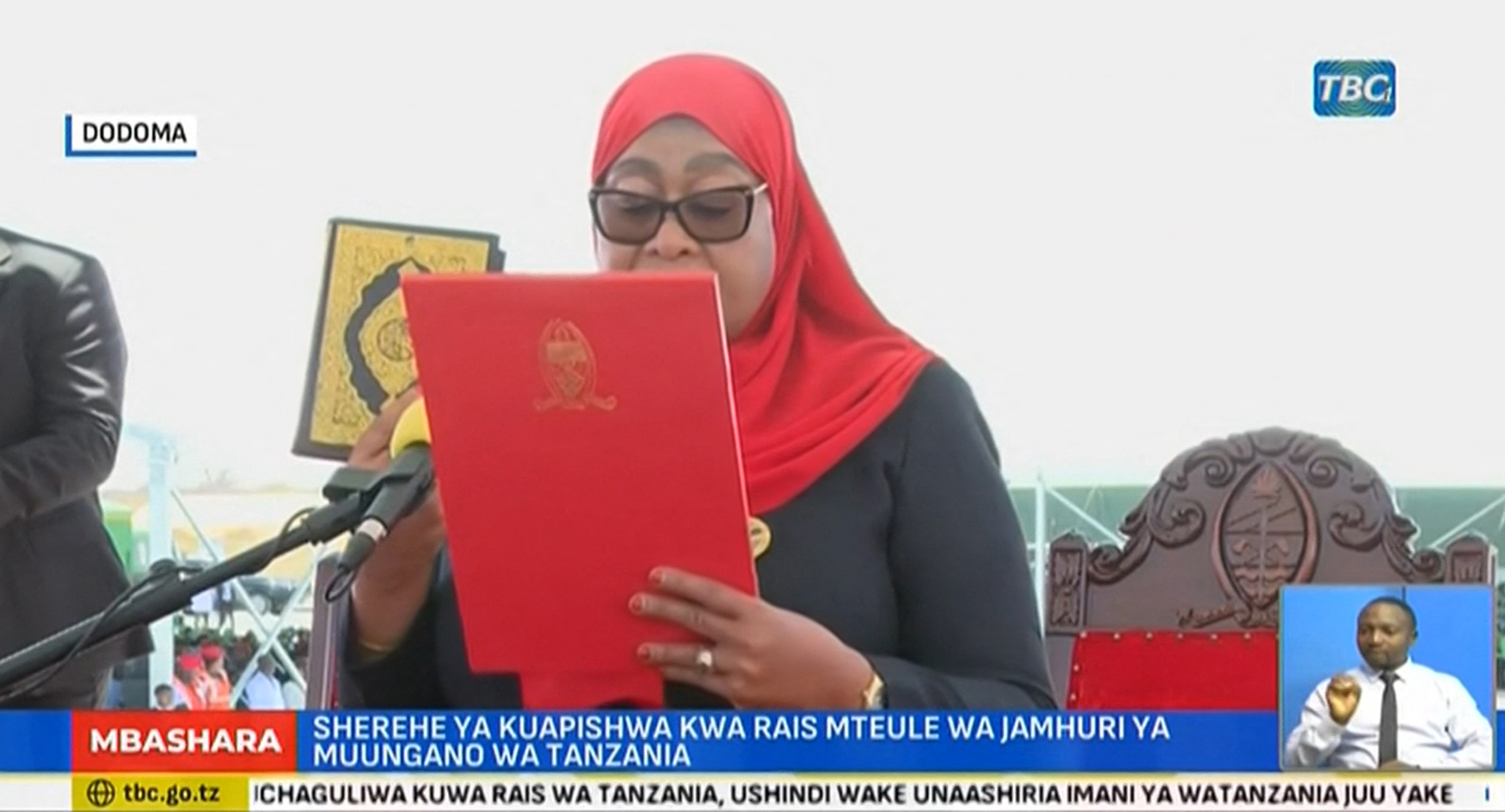 This video grab made from a video from the Tanzania Broadcasting Corporation (TBC) shows Samia Suluhu Hassan taking the oath of office during her inauguration ceremony in Dar es Salaam