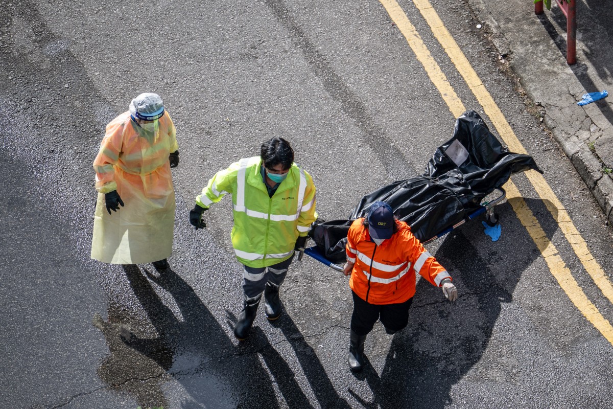 A body is transferred to a vehicle.