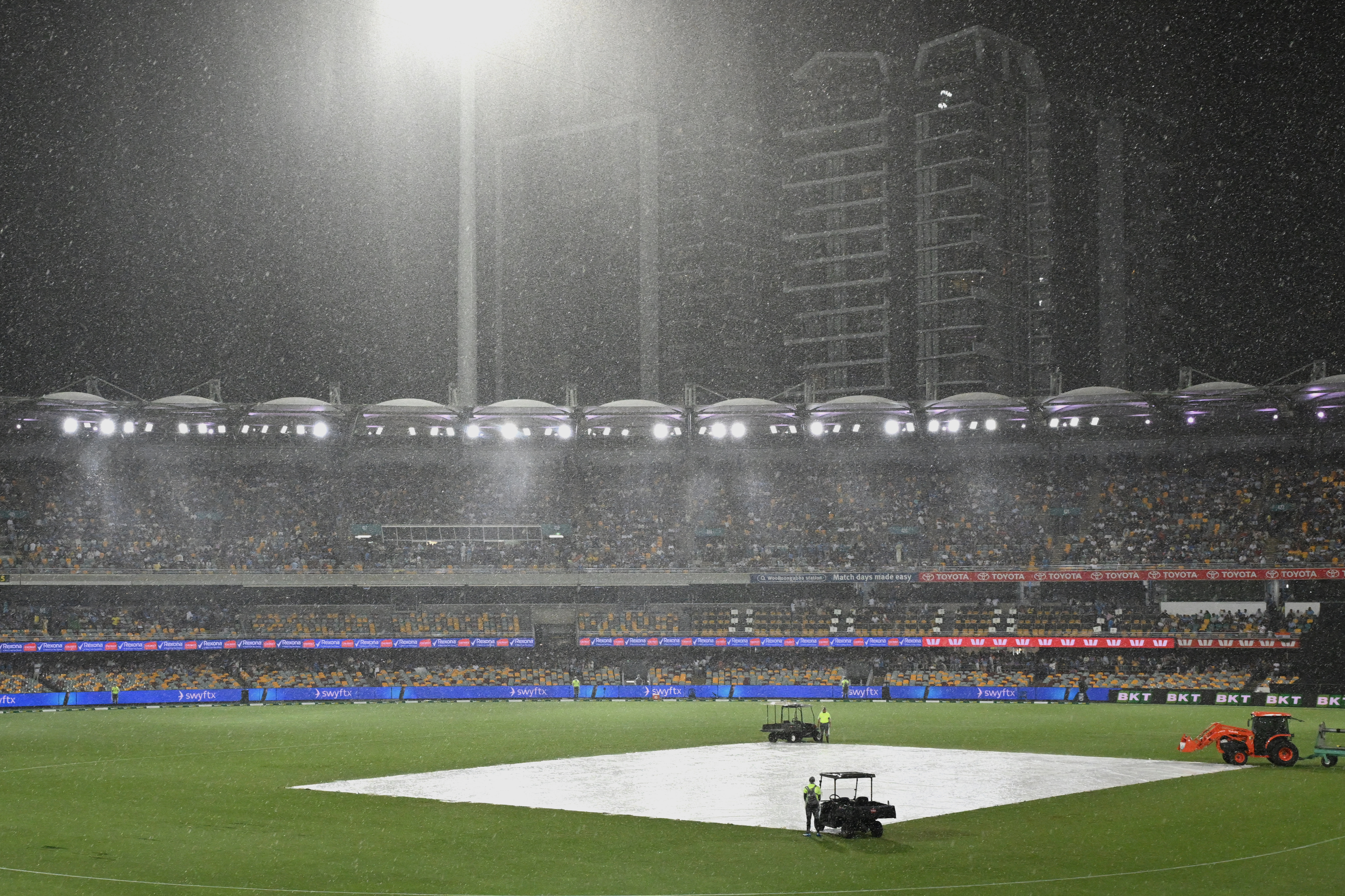 Rain falls during a T20 cricket international between India and Australia in Brisbane, Australia, Saturday, Nov. 8, 2025. (Darren England/AAPImage via AP)