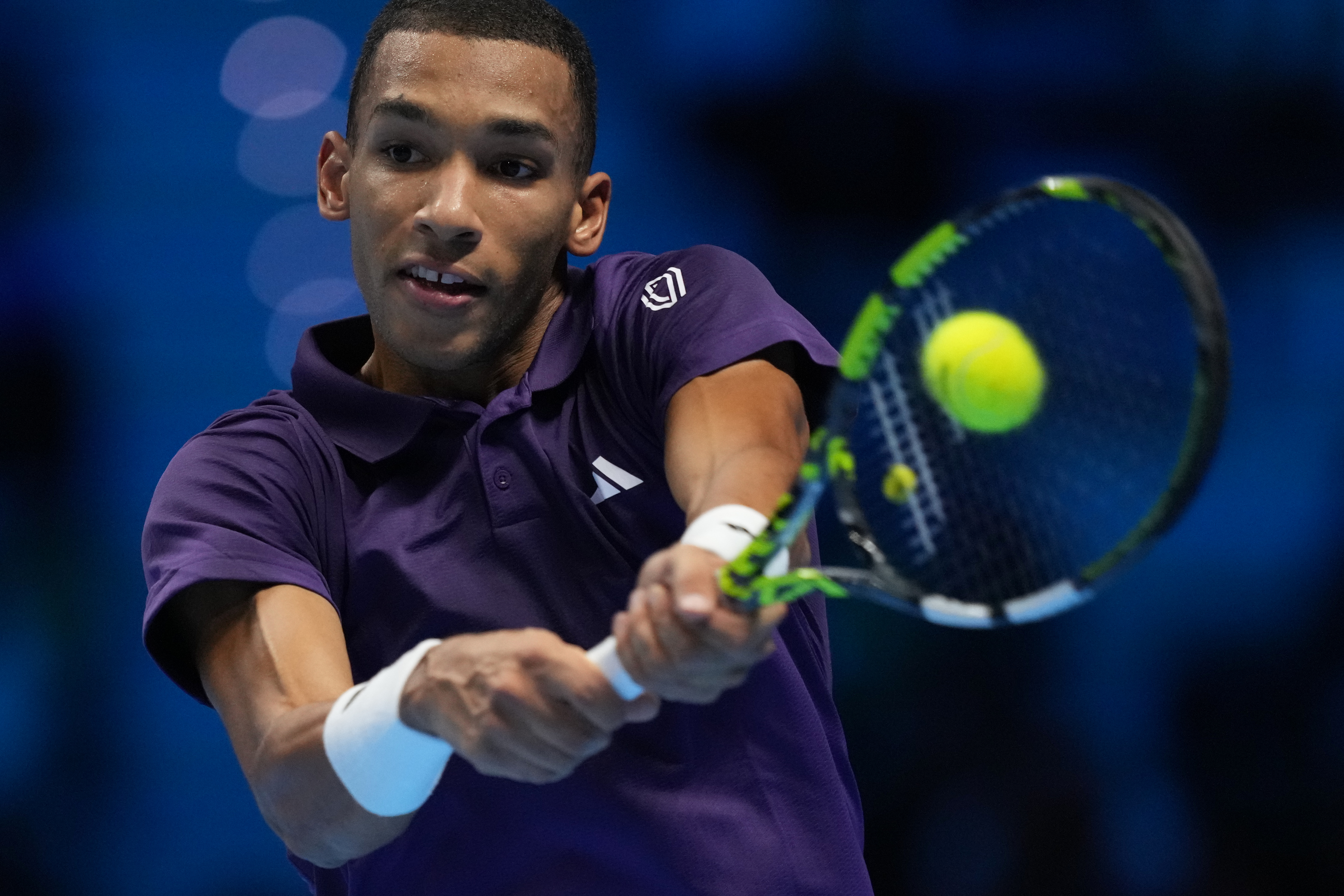 Felix Auger-Aliassime in action.