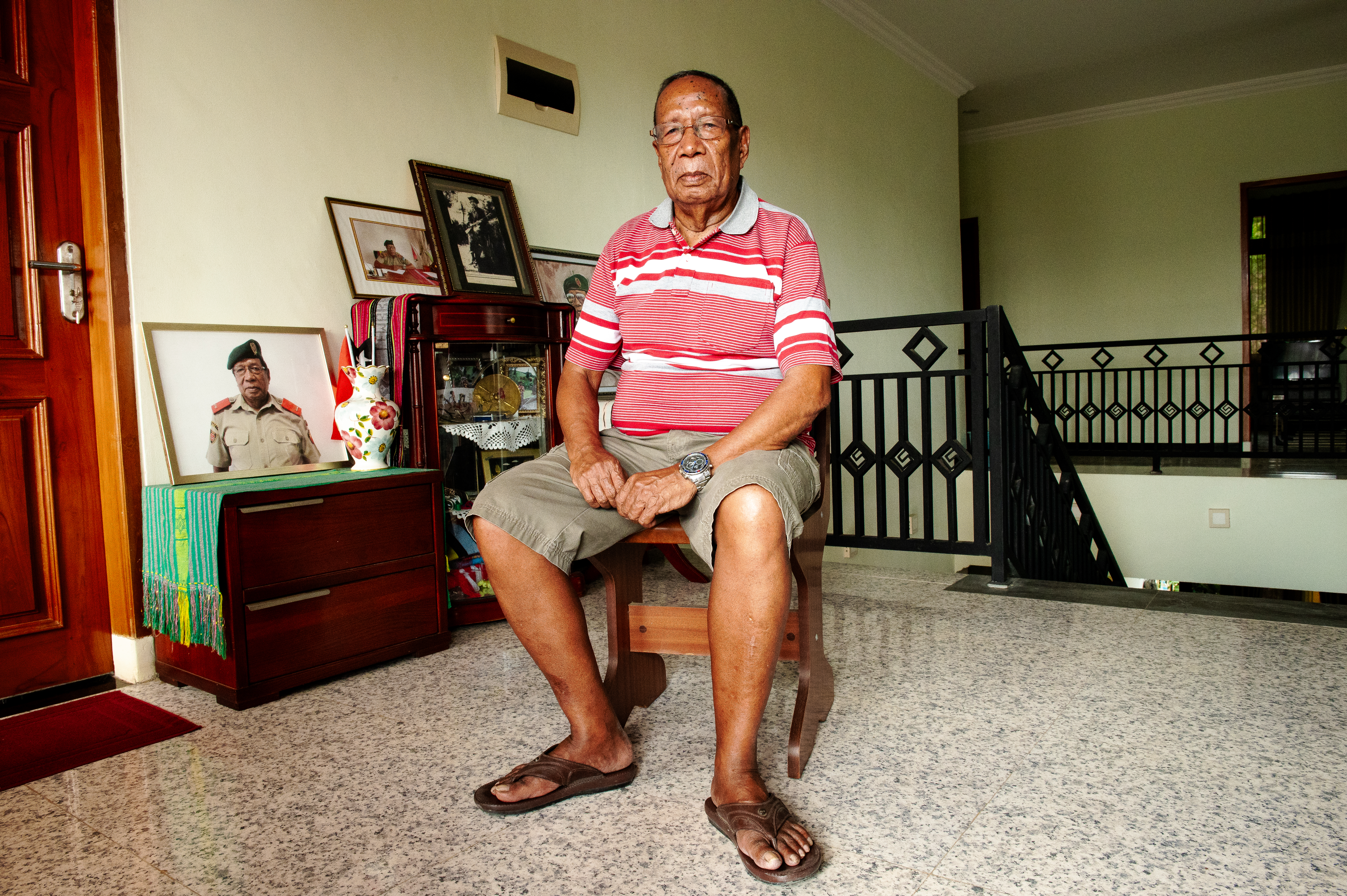 Major-General Americo Ximenes aka Sabika Besi Kulit ('Metal Skin') at his home on the outskirts of East Timor's capital, Dili. Ximenes told Al Jazeera he would wear such sandals, pictured here, when fighting the Indonesian military in the mountainous jungles for 24 years as they were 