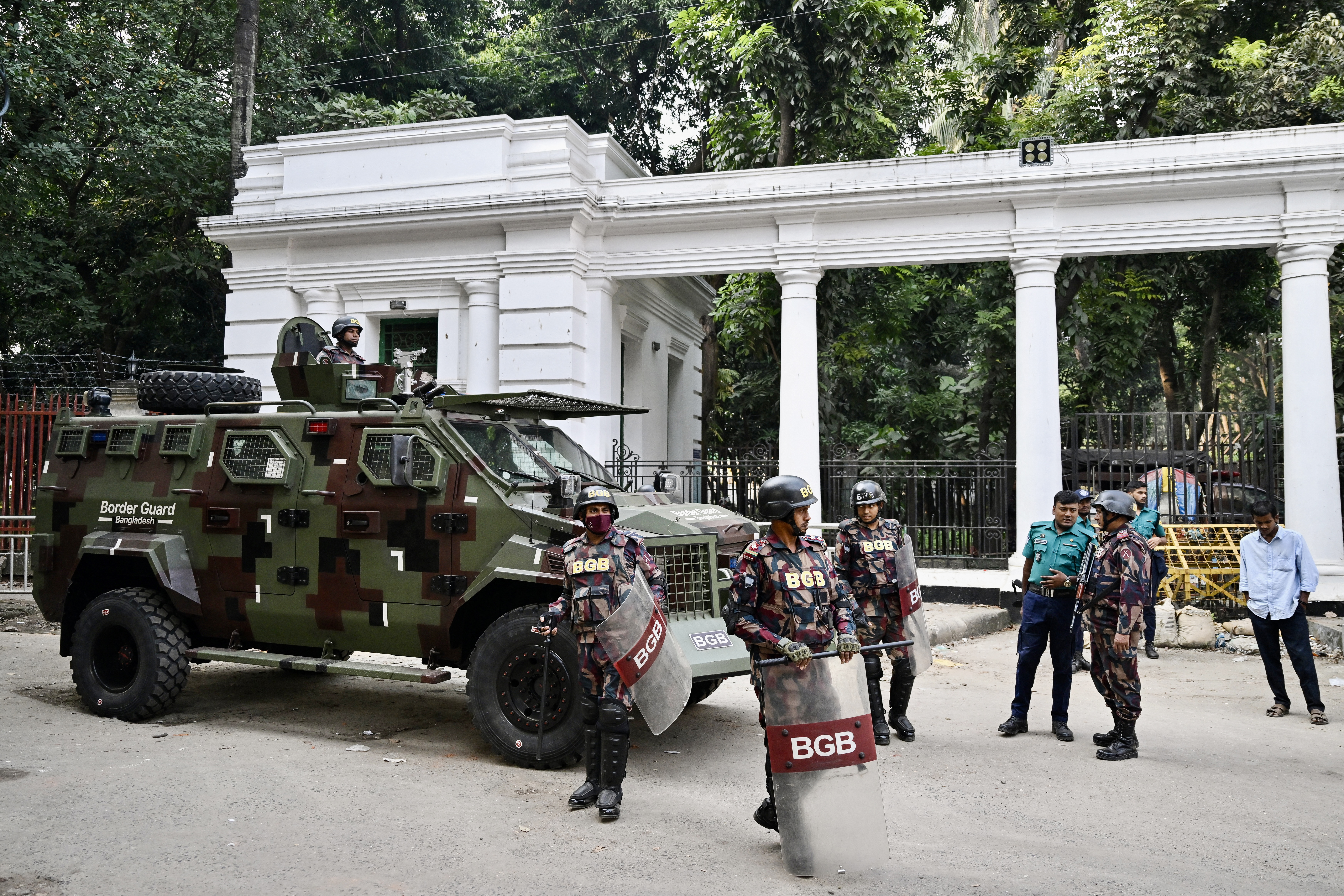 Border Guard Bangladesh (BGB) personnel stand guard outside the High Court in Dhaka on November 12, 2025.