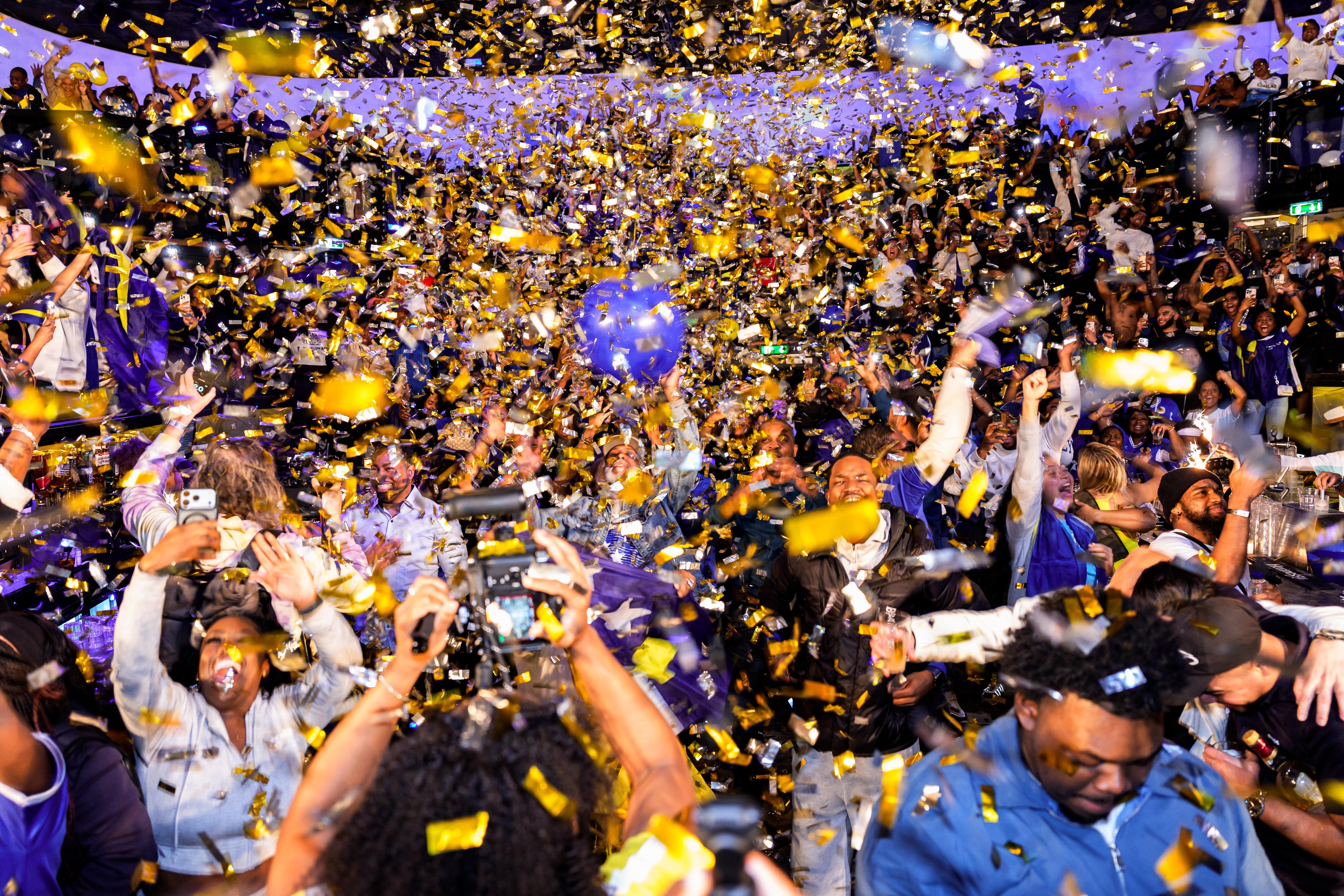 Curacao football fans watch the final qualifying match for the FIFA World Cup 2026 in a cafe in Rotterdam, Netherlands