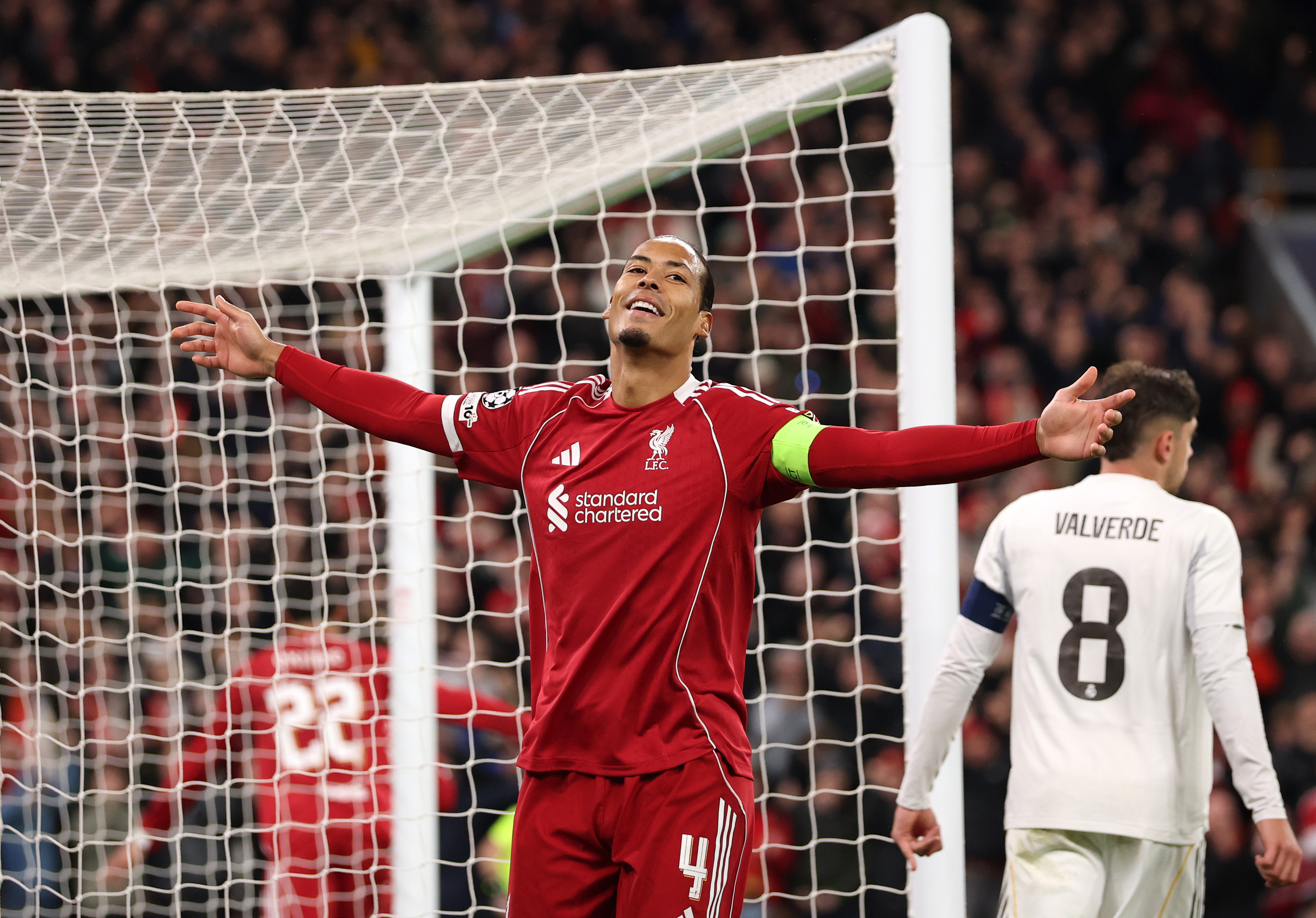 LIVERPOOL, ENGLAND - NOVEMBER 04: Virgil van Dijk of Liverpool celebrates his team's first goal scored by teammate Alexis Mac Allister (not pictured) during the UEFA Champions League 2025/26 League Phase MD4 match between Liverpool FC and Real Madrid C.F. at Anfield on November 04, 2025 in Liverpool, England. (Photo by Carl Recine/Getty Images)