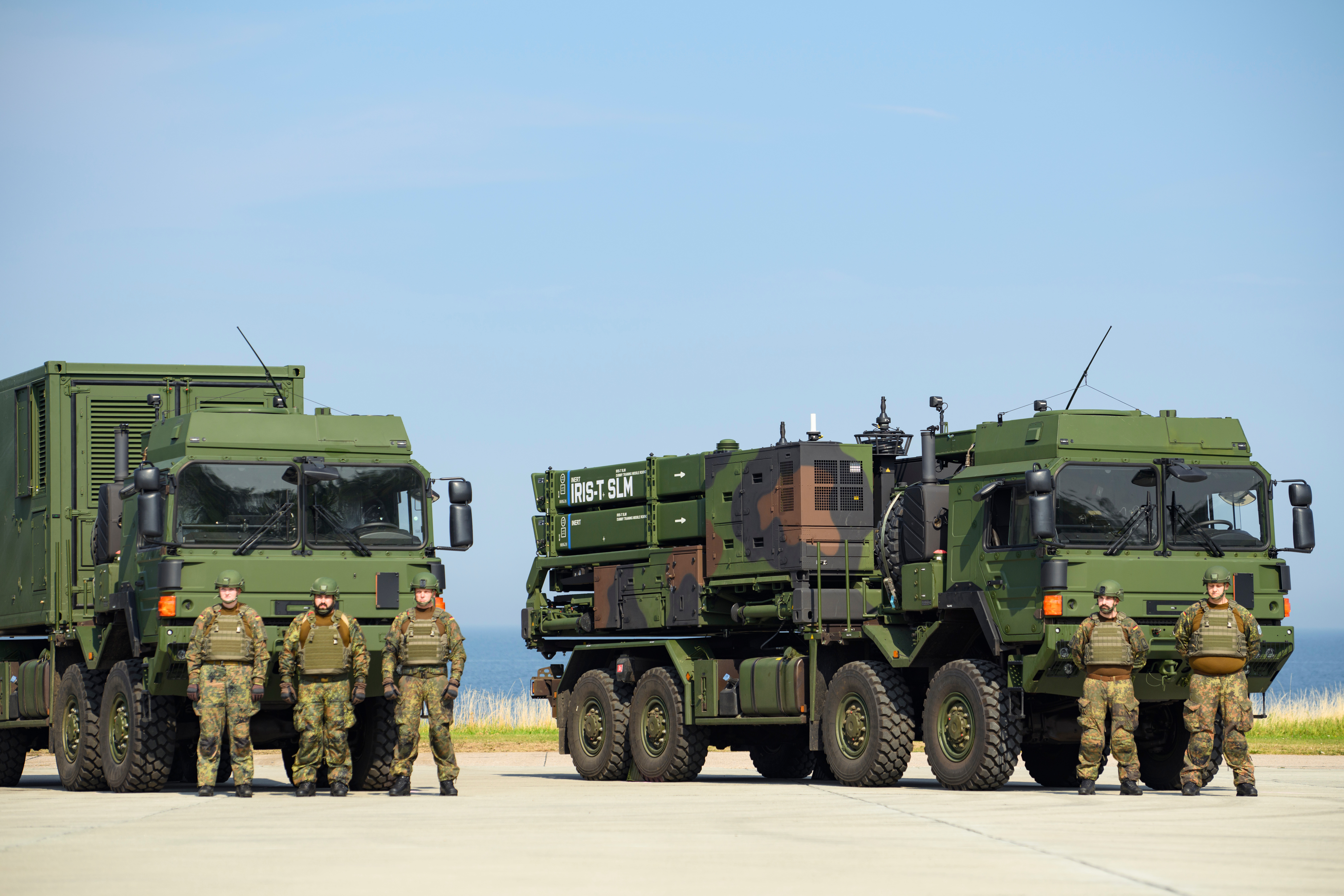 KIEL, GERMANY - SEPTEMBER 4: Soldiers standing guard in front of a IRIS-T SLM air defence system prior to the arrival of German Chancellor Olaf Scholz, Defence Minister Boris Pistorius and Lt. General Ingo Gerhartz, commander of the German air force (Inspekteur der Luftwaffe) during the operative launch of the Bundeswehr's first IRIS-T SLM air defence system at the Todendorf military base on September 4, 2024 in Panker, Germany. IRIS-T SLM, developed by Diehl Defence, is a medium-range system capable of bringing down drones, aircraft and missiles. Germany has already supplied Ukraine with at least three of the systems. (Photo by Gregor Fischer/Getty Images)