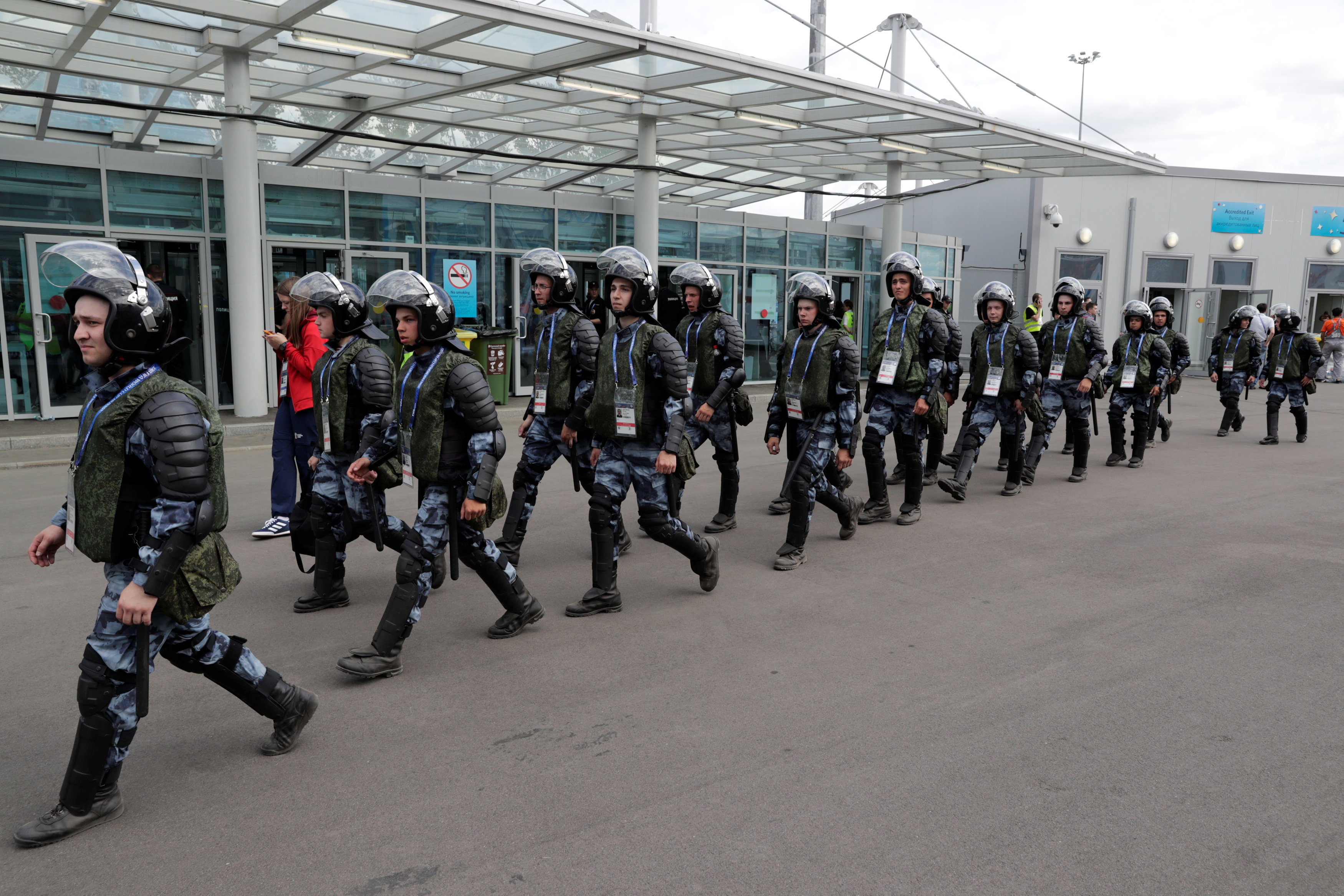 Soccer Football - World Cup - Group B - Morocco vs Iran - Saint Petersburg Stadium, Saint Petersburg, Russia - June 15, 2018 Riot police outside the stadium before the match REUTERS/Henry Romero
