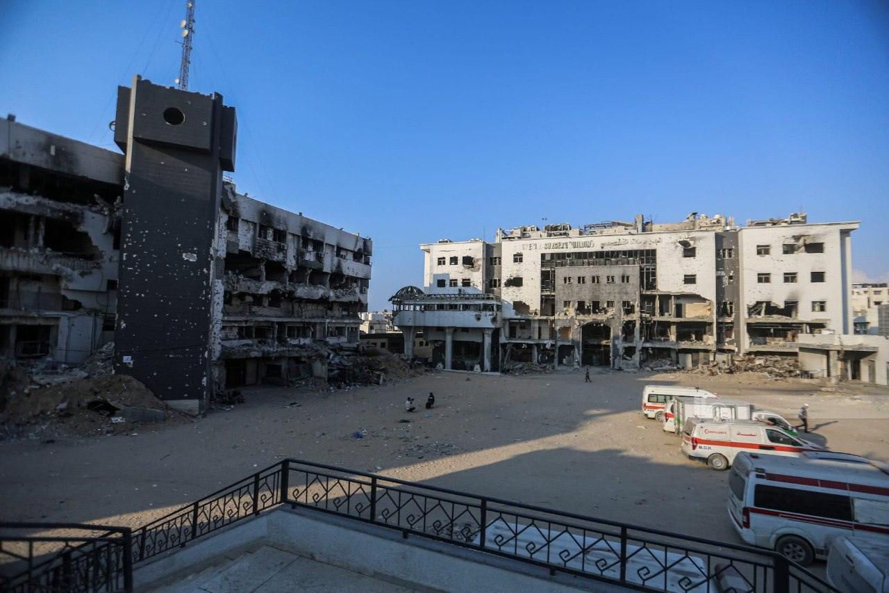 a photo of two damaged buildings at Al Shifa Medical Complex