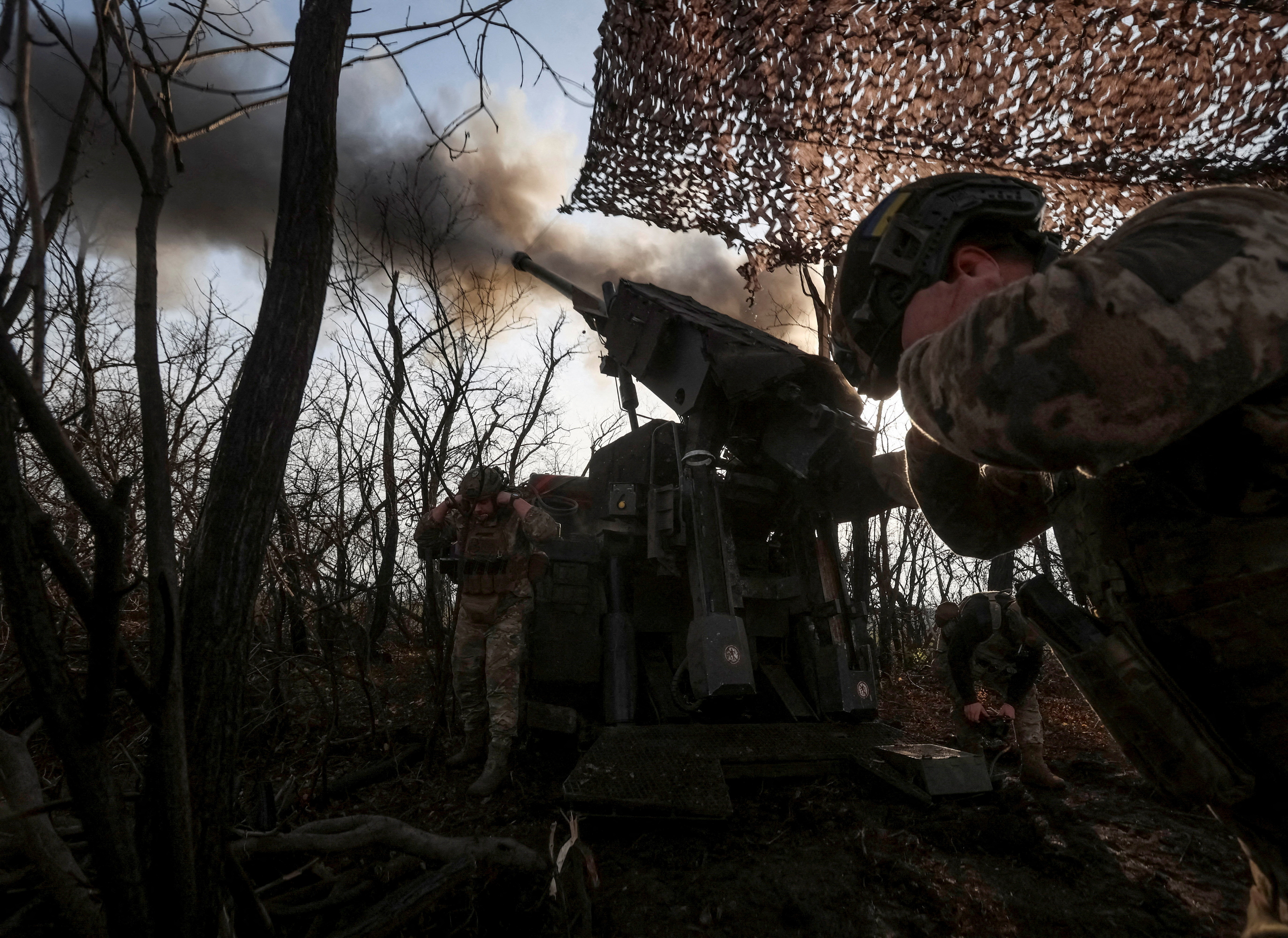 FILE PHOTO: Servicemen of the 148th Separate Artillery Zhytomyr Brigade of the Armed Forces of Ukraine fire a Caesar self-propelled howitzer towards Russian troops at a position on the front line, amid Russia's attack on Ukraine, near the frontline town of Pokrovsk in Donetsk region, Ukraine November 23, 2025. REUTERS/Anatolii Stepanov TPX IMAGES OF THE DAY/File Photo