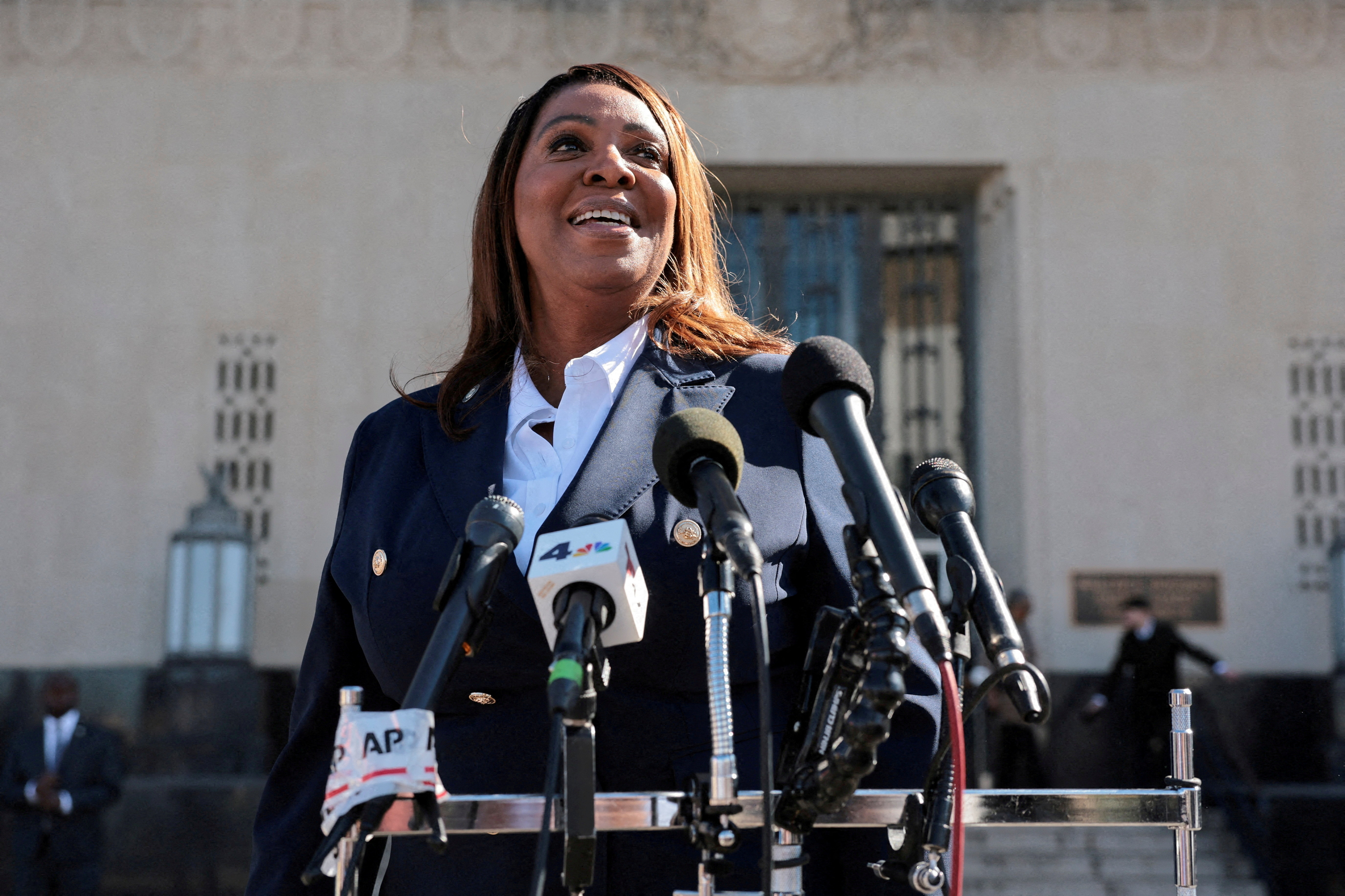 FILE PHOTO: New York Attorney General Letitia James speaks to the media after she pleaded not guilty to charges that she defrauded her mortgage lender, outside the U.S. District Court for the Eastern District of Virginia, in Norfolk, Virginia, U.S., October 24, 2025. REUTERS/Jonathan Ernst/File Photo