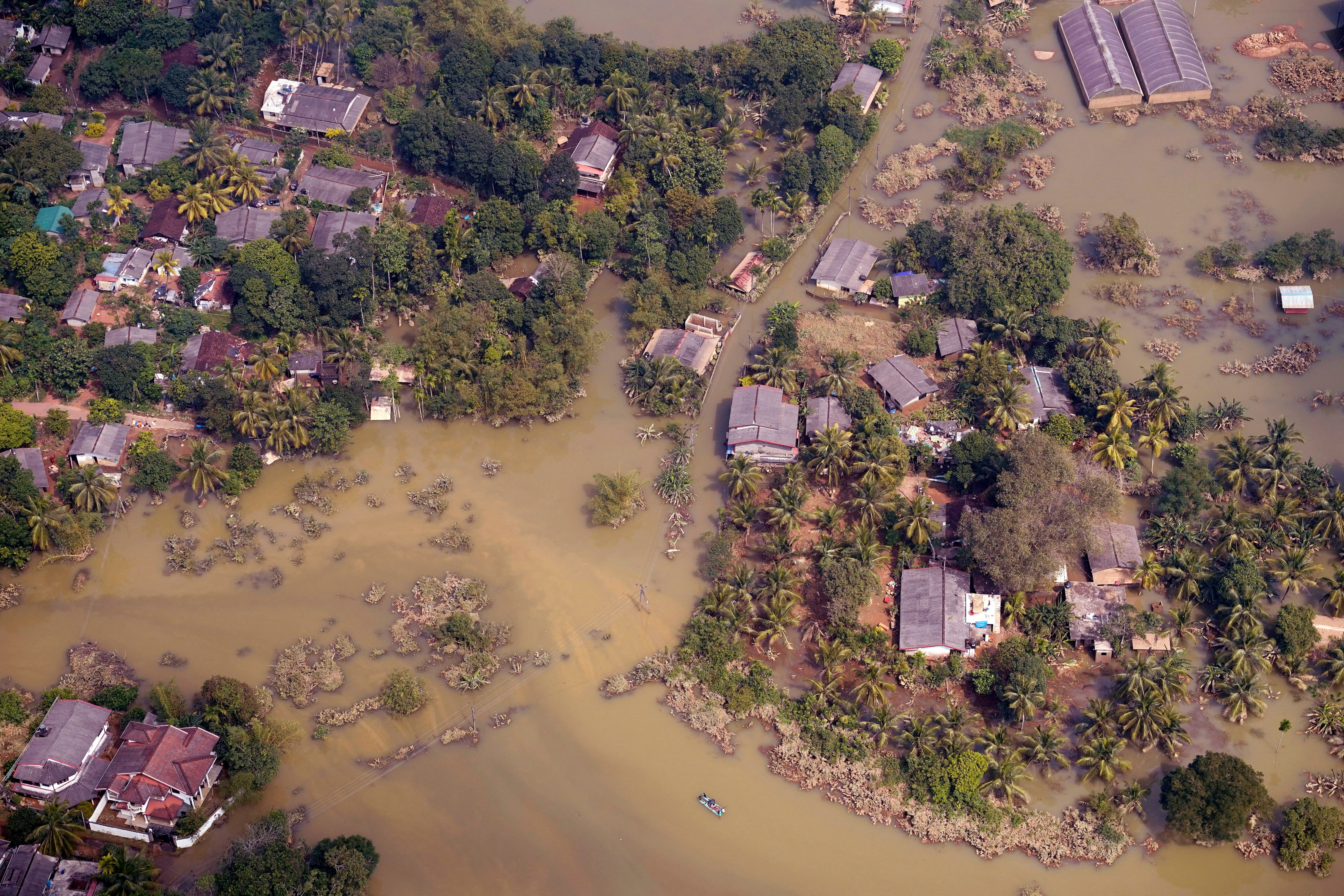 FILE PHOTO: An aerial view of submerged houses in a flooded area caused by heavy rainfall following Cyclone Ditwah in Niyamgamdora, Sri Lanka, December 2, 2025 REUTERS/Akila Jayawardena/File Photo
