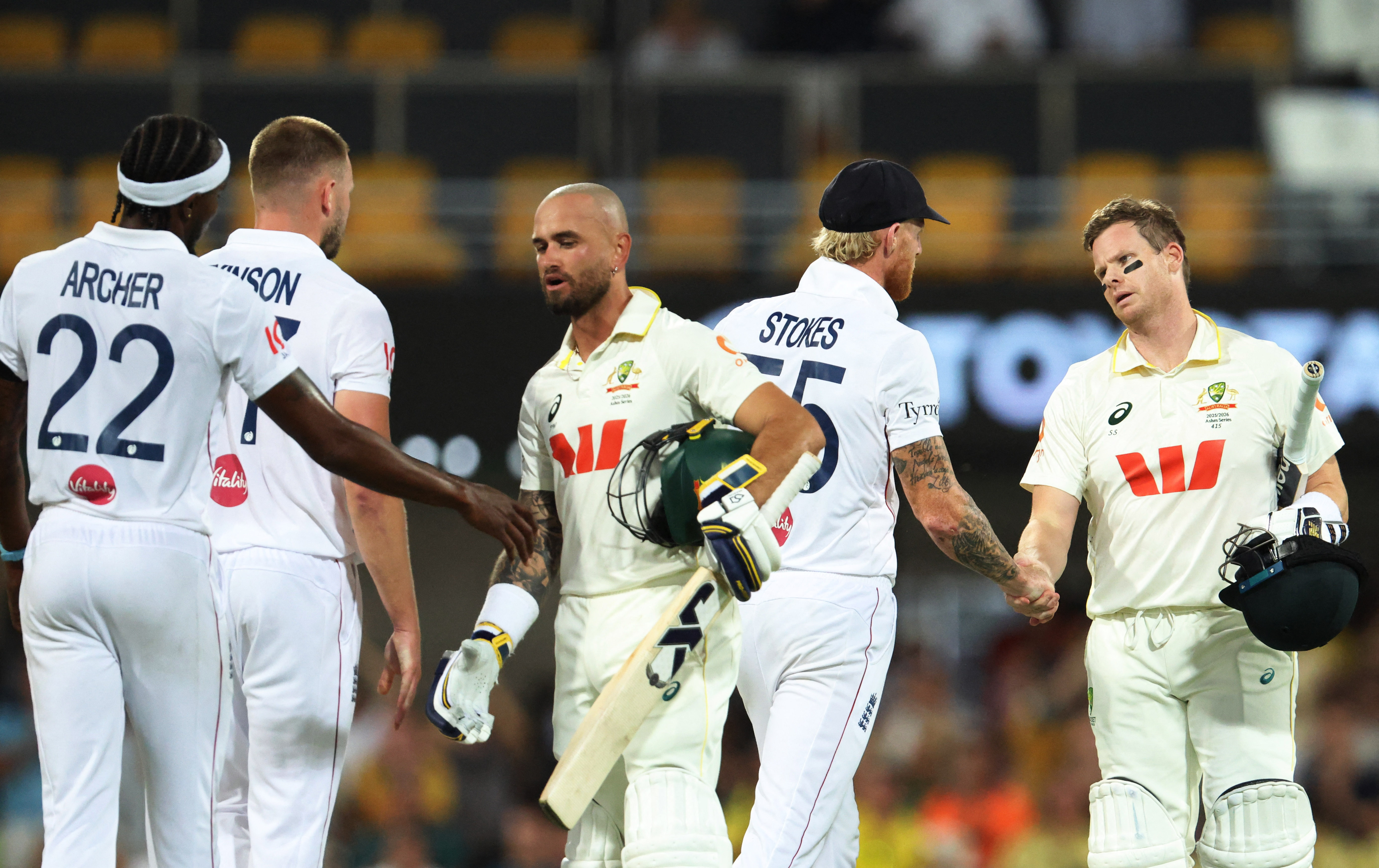 Ben Stokes and Steve Smith shake hands.