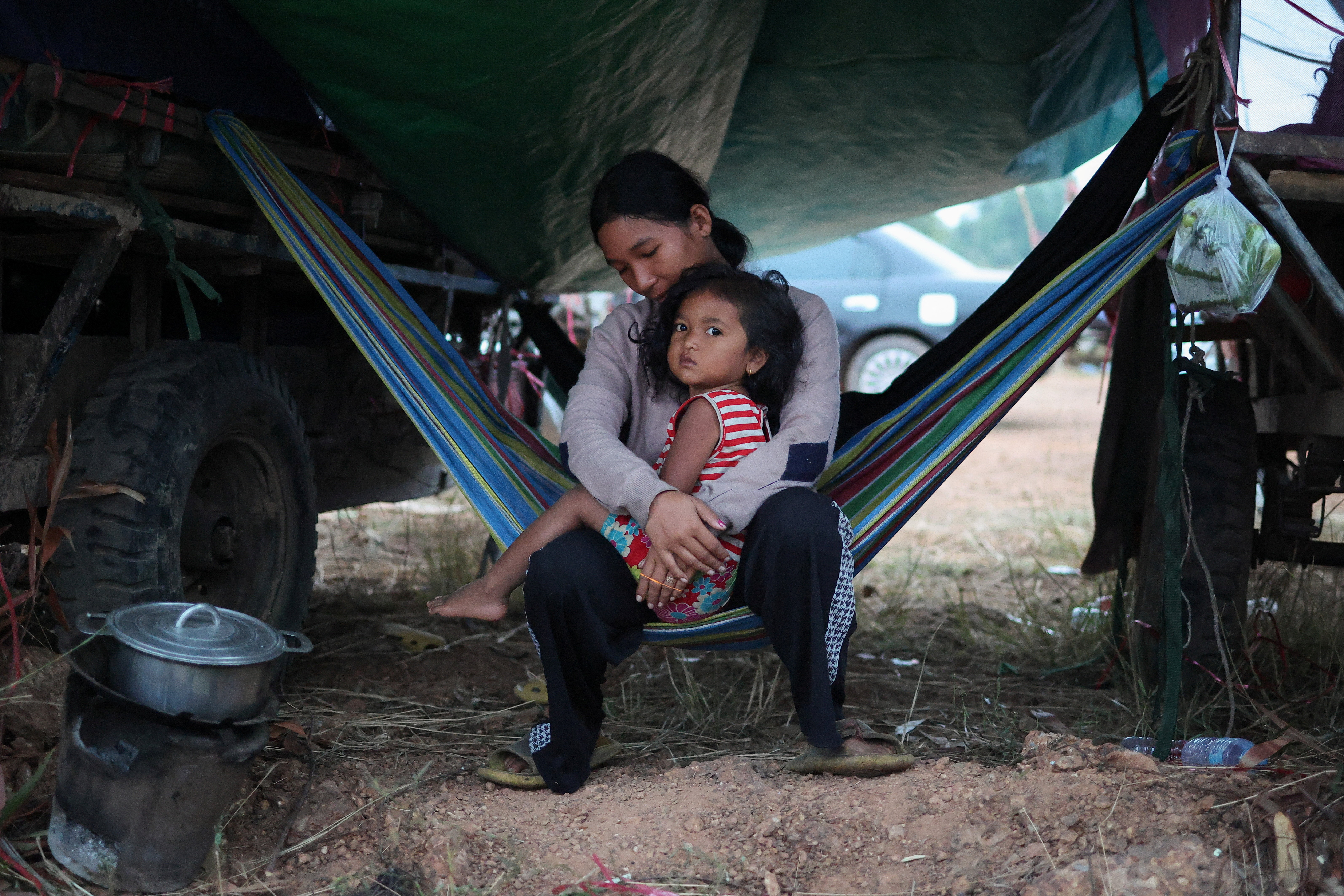 A woman and a child at a refugee camp after evacuation, in Srei Snam, Siem Reap province, Cambodia