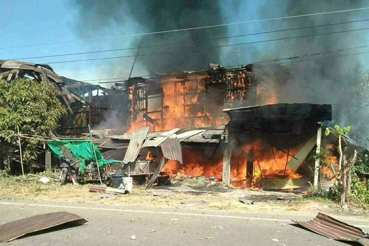 Smoke rises from damaged buildings, in a location given as Kantharalak District, Sisaket Province, Thailand, in this still image released on December 13, 2025. Royal Thai Army Region 2/Handout via REUTERS THIS IMAGE HAS BEEN SUPPLIED BY A THIRD PARTY. MANDATORY CREDIT VERIFICATION LINE: -Reuters able to verify the location in parts of the video (put in timecodes for final edit) confirmed by buildings, building structure and road layout. -Reuters was not able to independently verify the location in other parts of the video and the date of the video. -Thai army stated that the civilian area in Saothongchai Subdistrict, Kantharalak District, Sisaket Province was attacked on Saturday (December 13, 2025)