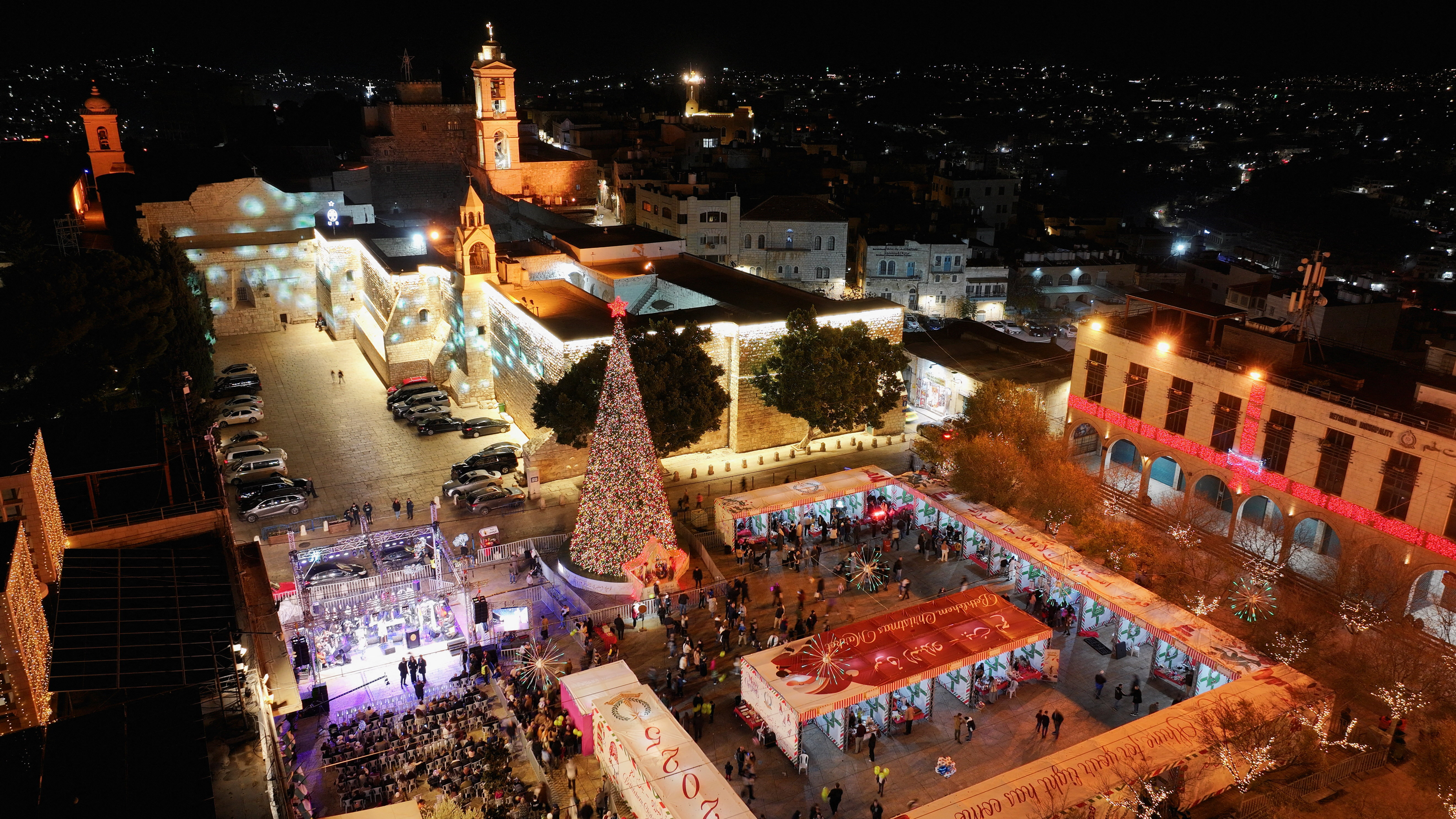 A drone view of the Church of Nativity and the Manger Square, during a Christmas parade in Bethlehem, in the Israeli-occupied West Bank
