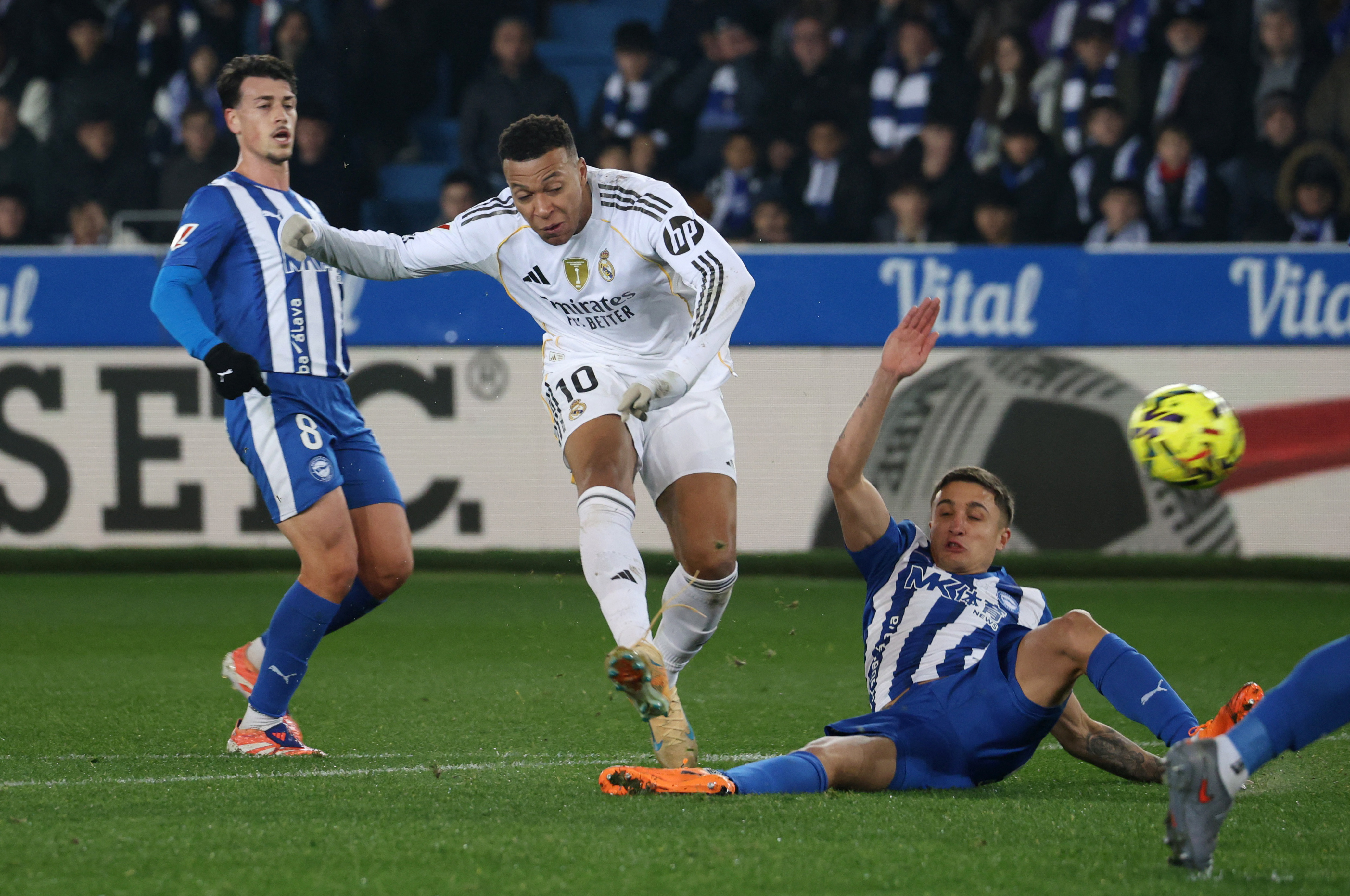 Real Madrid's Kylian Mbappe scores their first goal