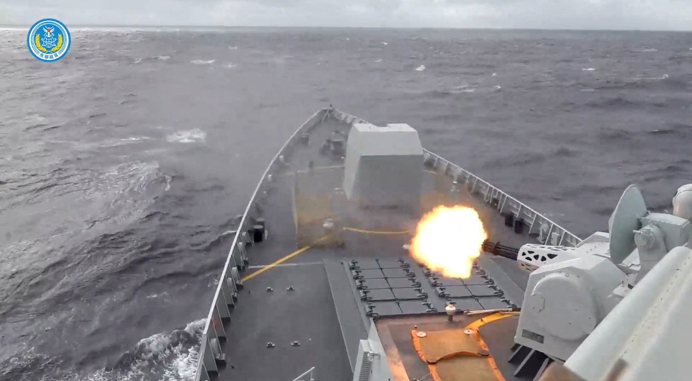 A ship fires a weapon during drills east of Taiwan, in this screenshot from a video released by the Eastern Theatre Command of China's People's Liberation Army (PLA) on December 29, 2025. Eastern Theatre Command/Handout via REUTERS ATTENTION EDITORS - THIS IMAGE WAS PROVIDED BY A THIRD PARTY. MANDATORY CREDIT. NO RESALES. NO ARCHIVES. TPX IMAGES OF THE DAY