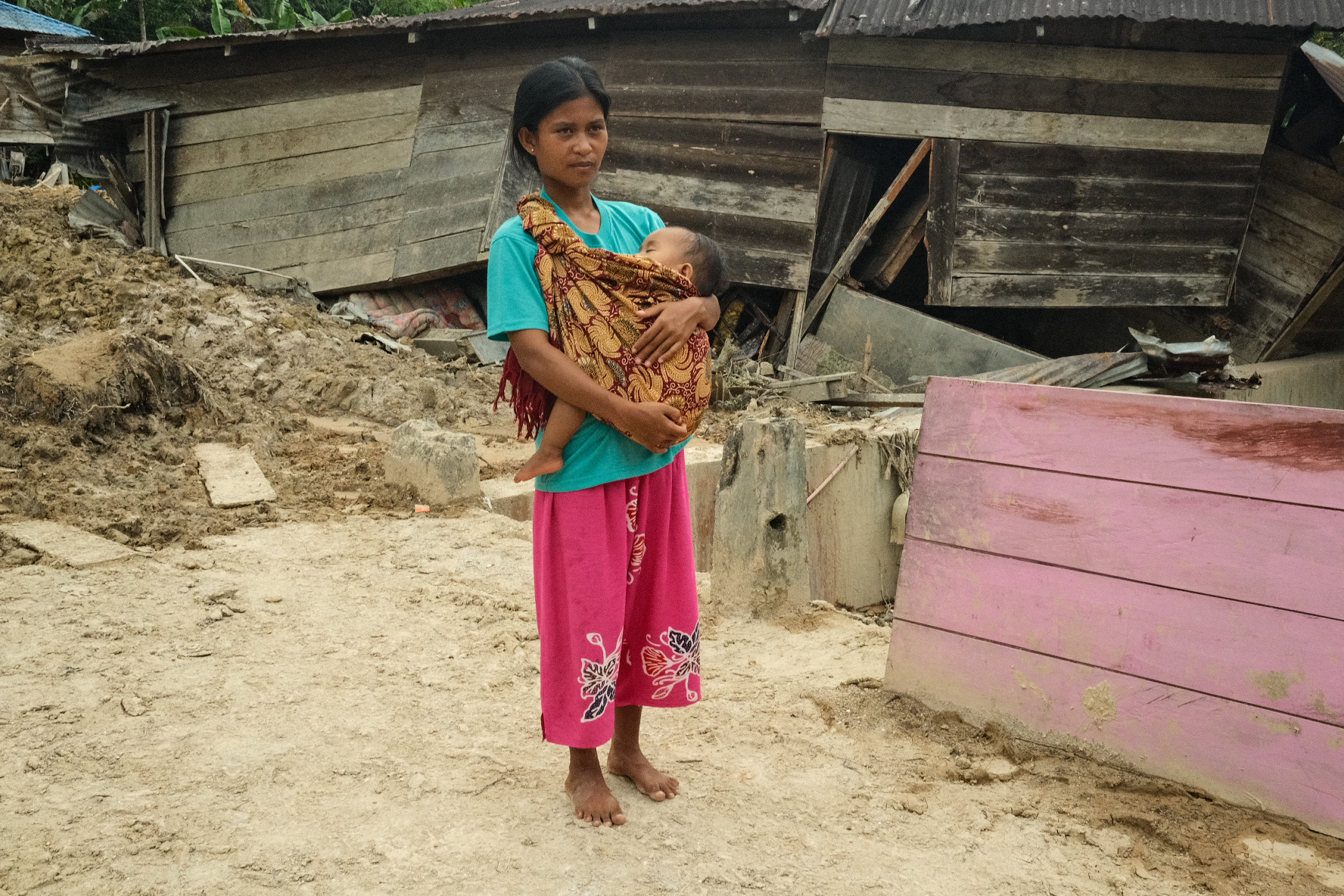 Being out of their home with a young child is not easy, Sri Yuni Pardede said. “We are not feeling well. There are many loud noises, and theres a lot of dust. My child has been sick lately. We don’t know what to do next, but at least we are grateful to still have life,” she said.