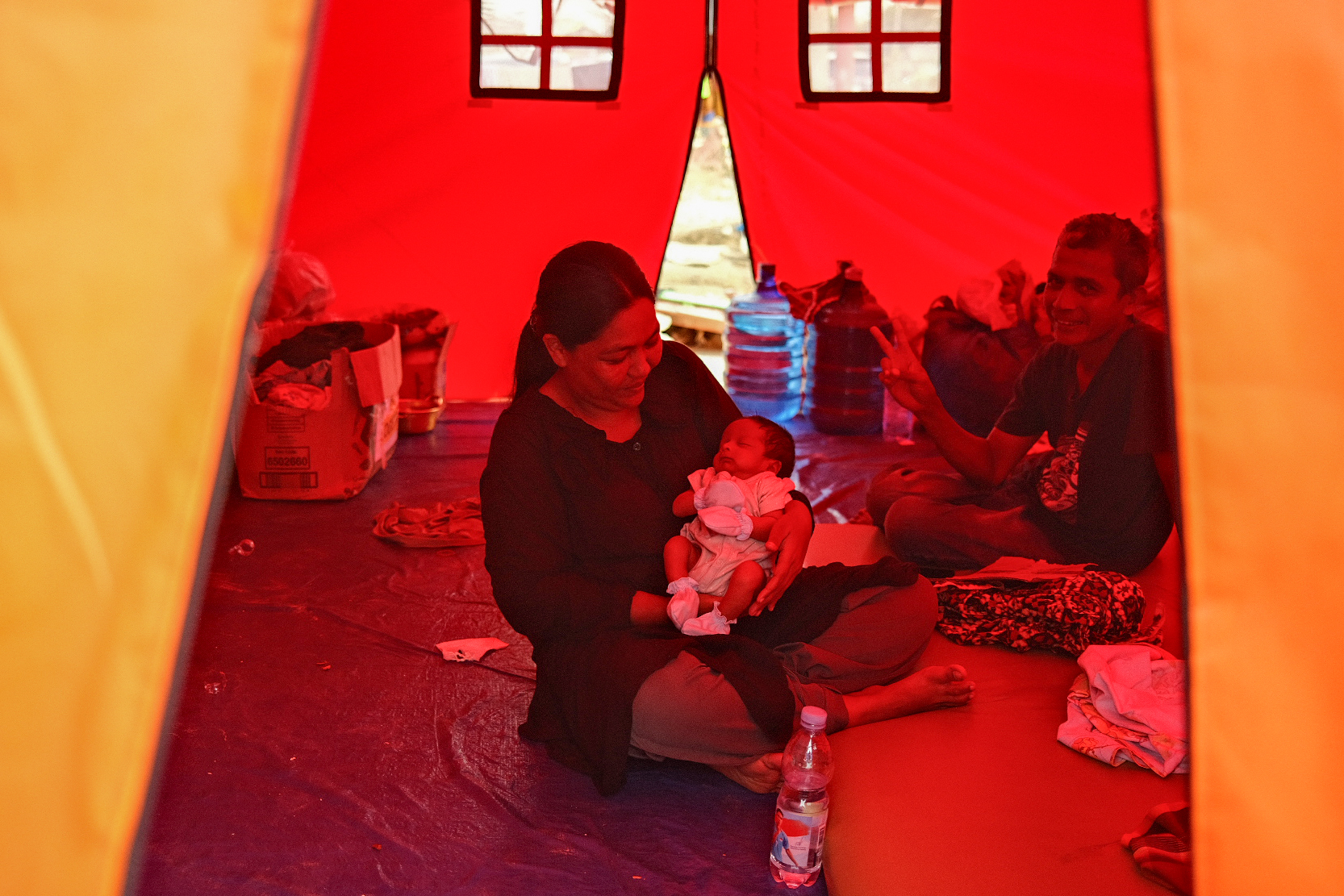 Lia’s tent is located on the ruins of her village, where 40 houses once stood. With stagnant water surrounding them, the spread of mosquito-borne diseases is a serious concern, for health authorities and parents alike. “I always hold him at night because I’m afraid of the mosquitoes,” she said. The family said they don’t have sufficient food, but they have no means to go anywhere else.