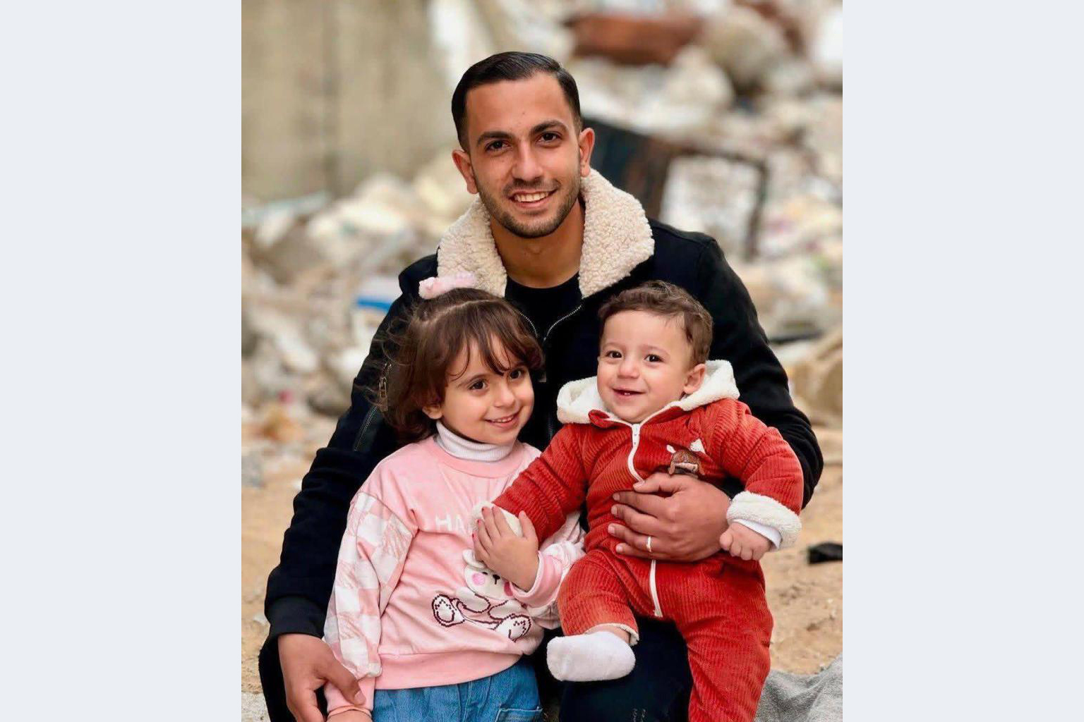 Al Jazeera correspondent Anas al-Sharif poses for a photo with his children. Al-Sharif was killed in a targeted Israeli attack on August 10, 2025.