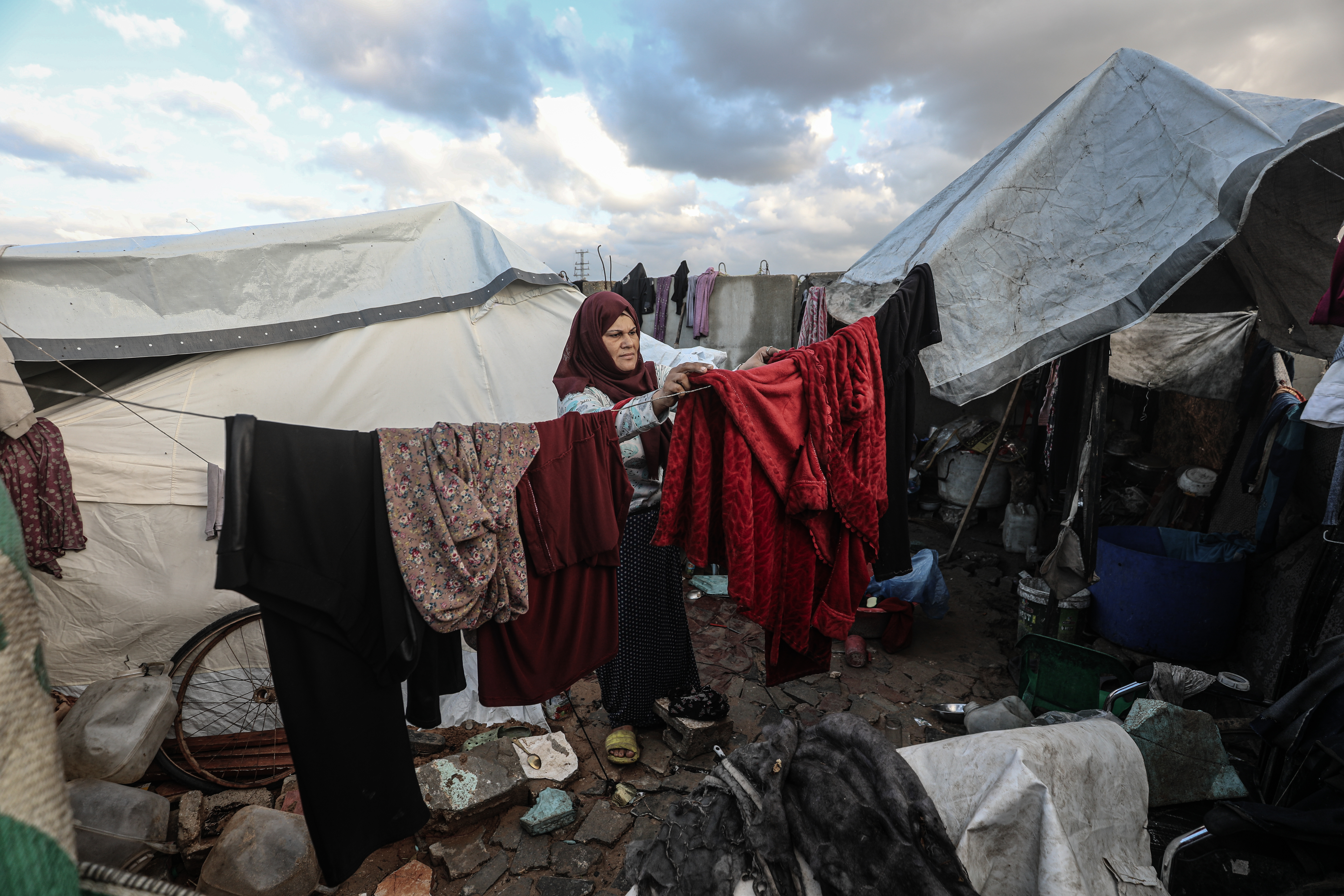Flooding hits displaced Palestinians’ tents after heavy rain in Gaza