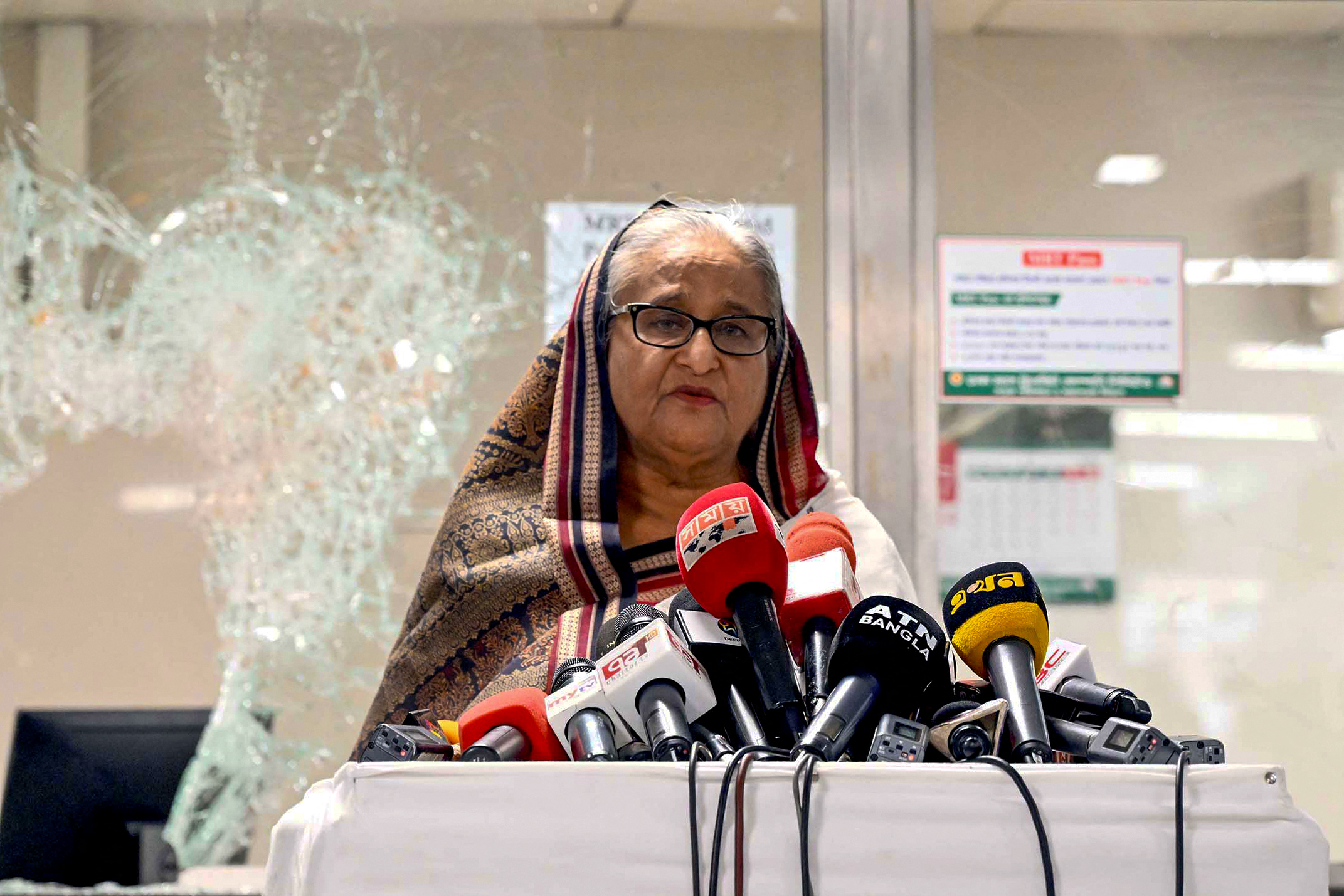 Prime Minister Sheikh Hasina addresses the media at a vandalized metro station in Mirpur, during protests in July 2024