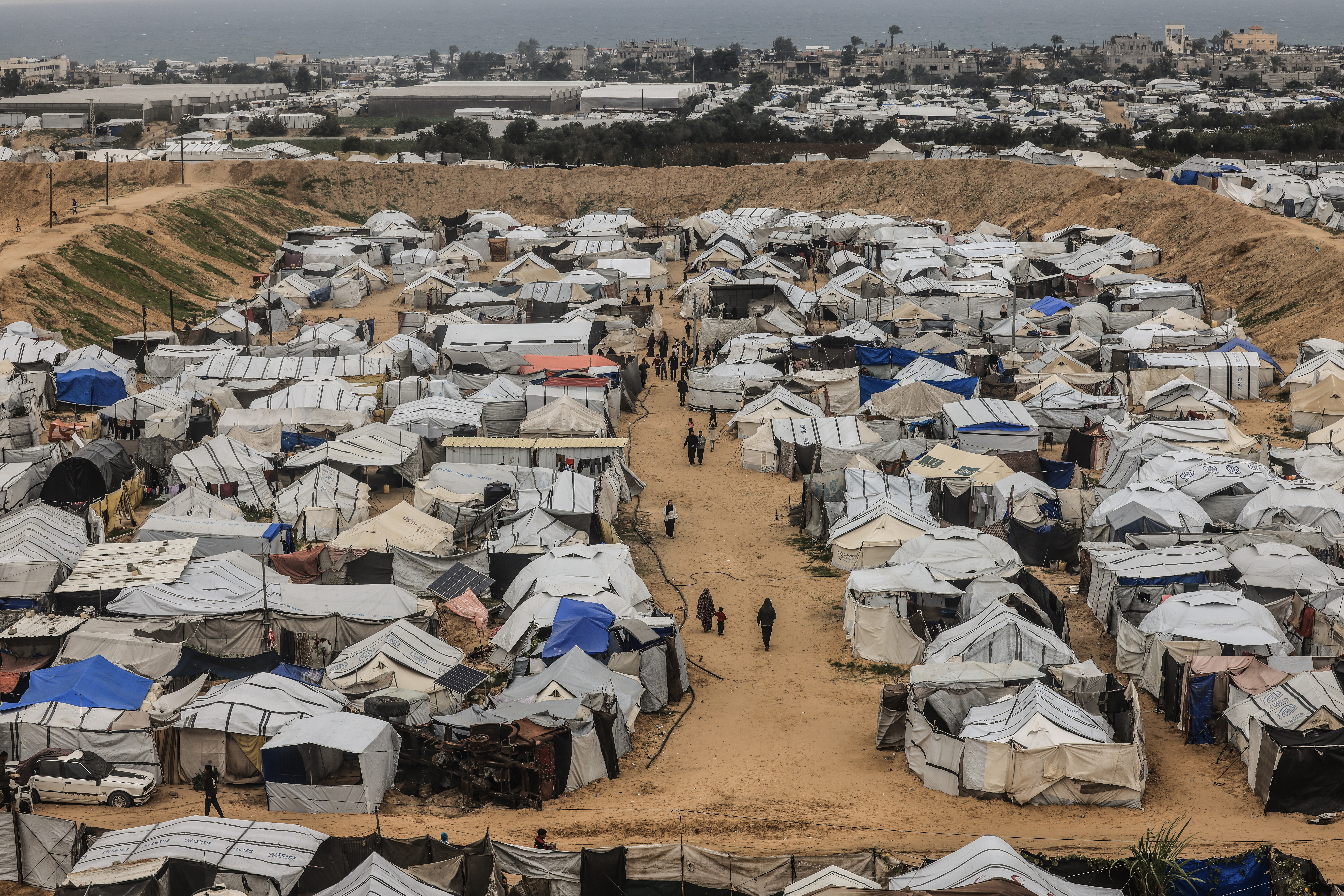 Palestinian families displaced during the Gaza war which destroyed their homes
