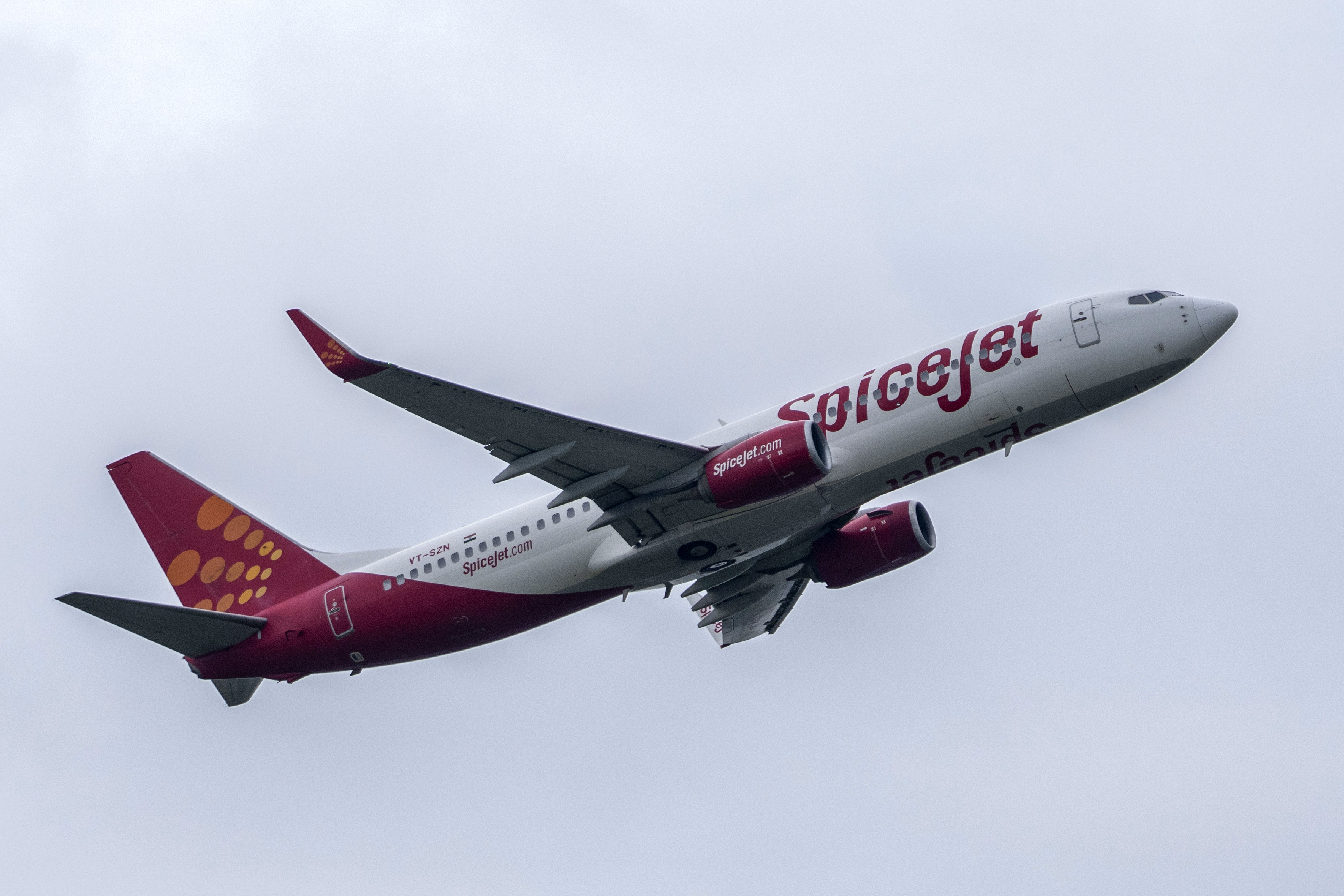 An aircraft of India's airline SpiceJet takes off in Mumbai, India, Sunday, Aug. 7, 2022. (AP Photo/Rafiq Maqbool)