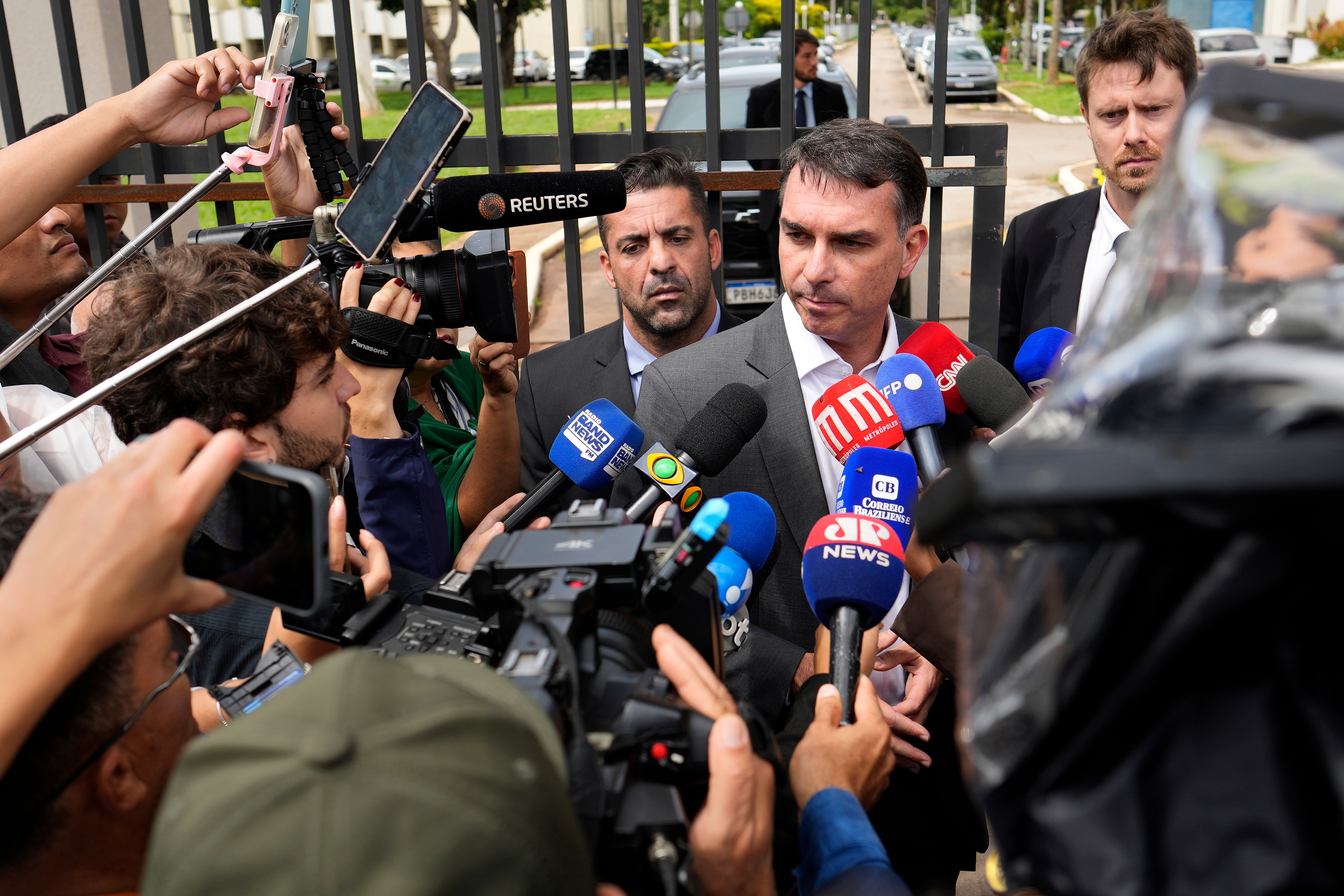 Flavio Bolsonaro speaks to reporters