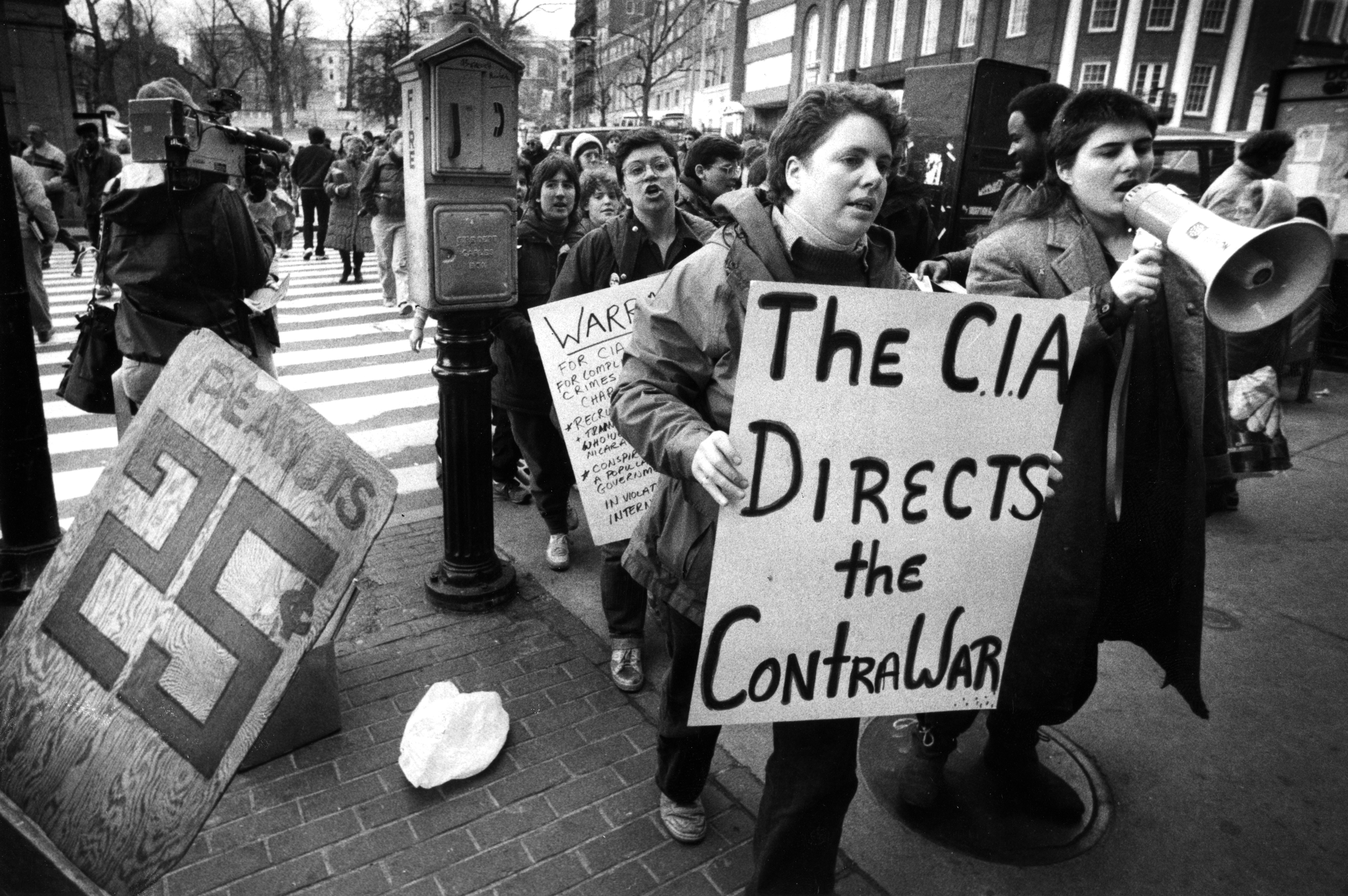 Members of Boston Feminists march outside the office of the Central Intelligence Agency on Winter Street in Boston to protest war in Nicaragua on March 2, 1986.