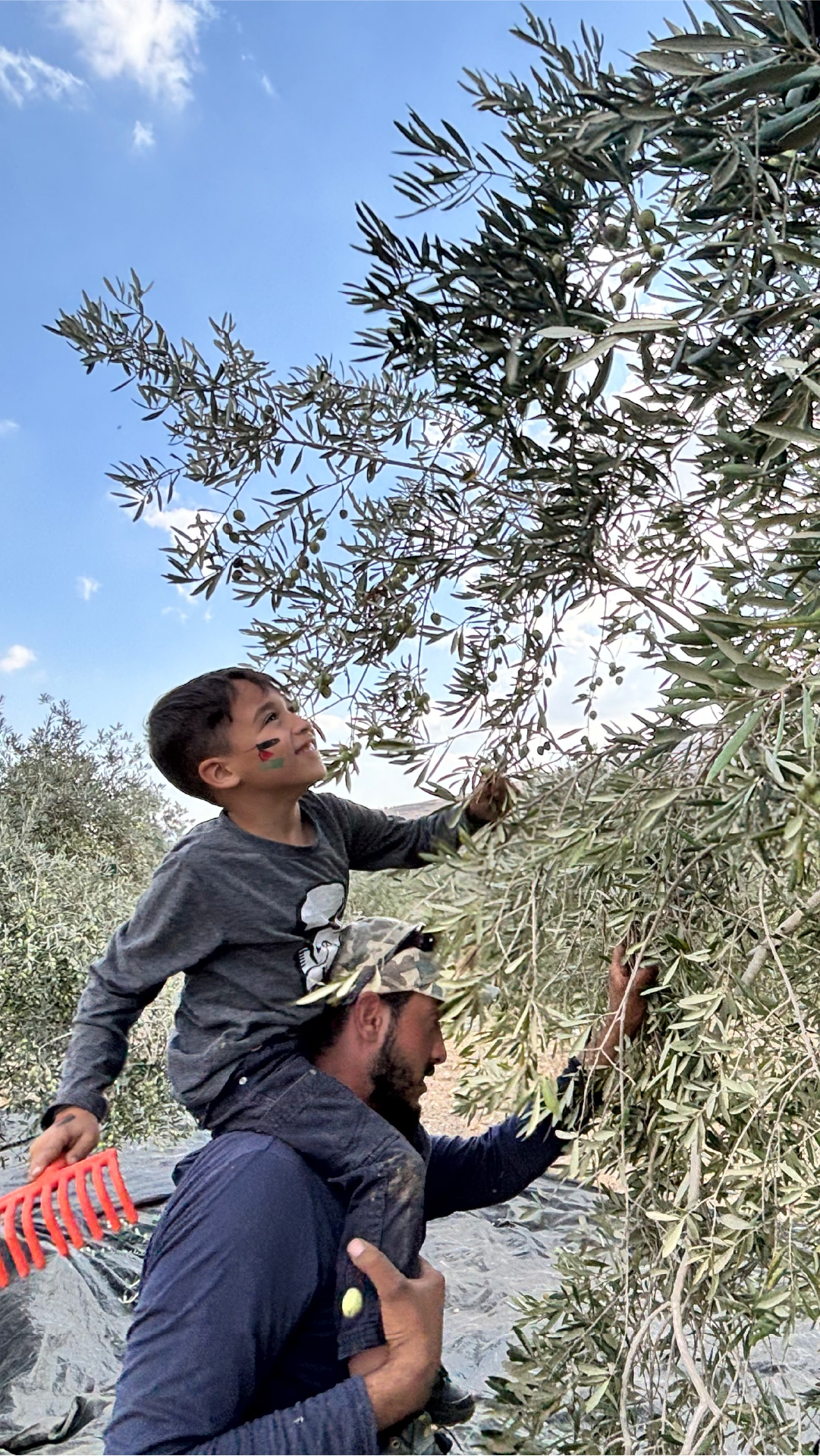 INTERACTIVE - Ghaith Castro on his uncle's shoudlers smiling mobile-1764685610