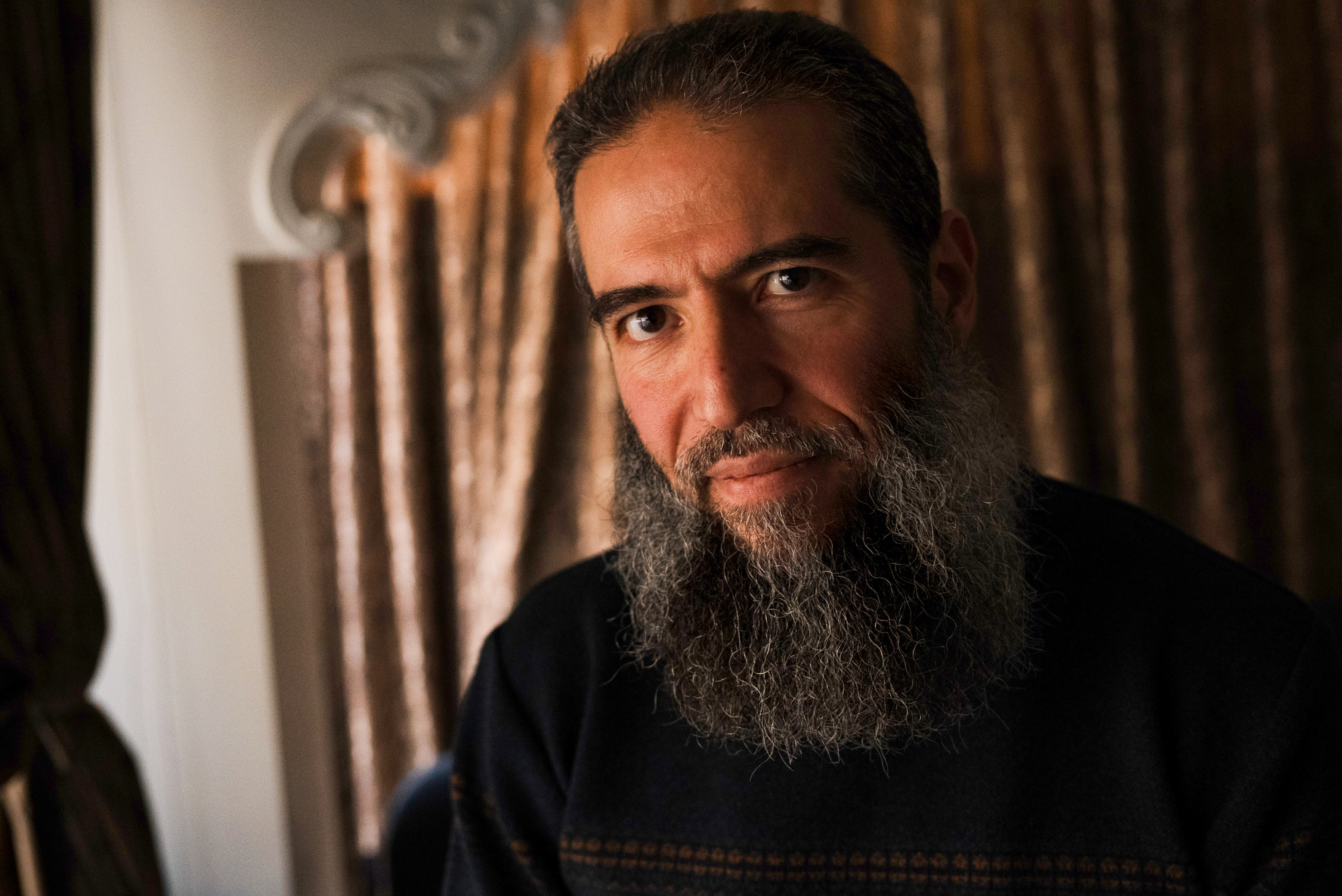 Fouad Naal, pictured here at his home in Damascus, spent 21 years in Syrian prisons under Bashar al-Assad's regime [Adrian Hartrick/Al Jazeera]