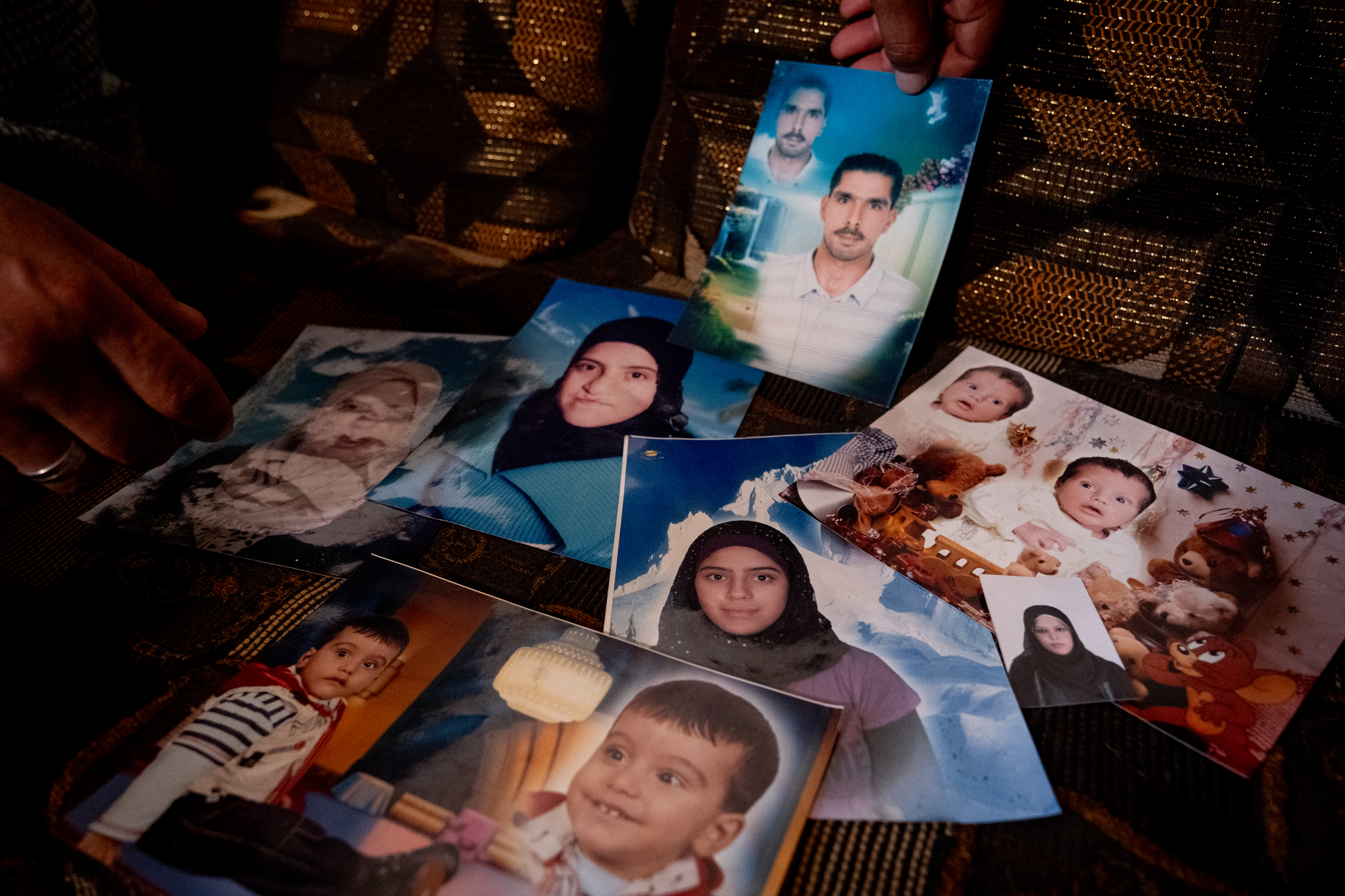 Photographs of some of the family members Ziad Mahmoud Al Amayiri believes were arrested and ultimately disappeared by the pro-Assad National Defence Forces. 