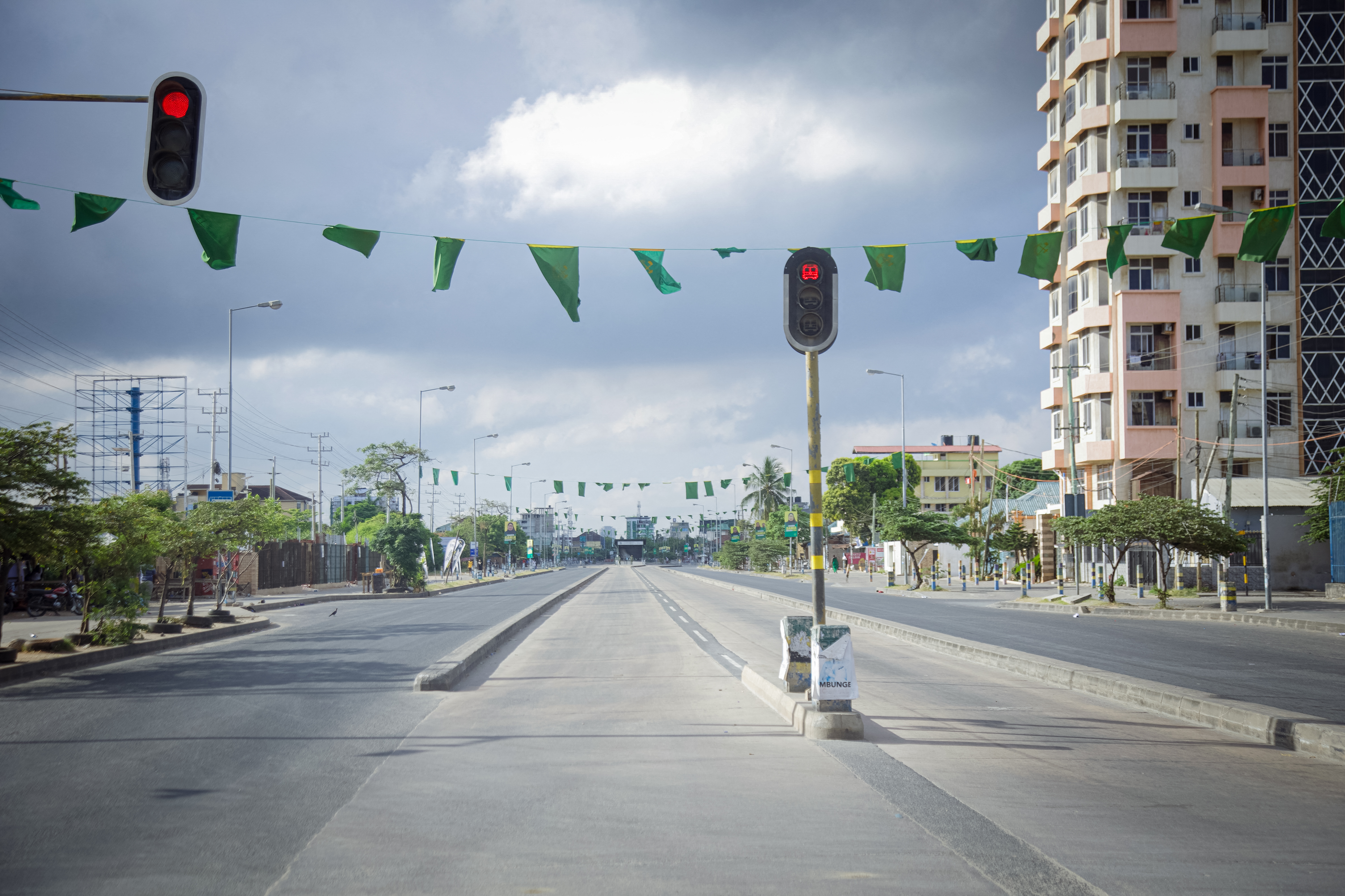 A general view of a deserted avenue in Dar Es Salaam on December 9, 2025 during a day of demonstrations agaisnt the violent crackdown by security forces on election demonstrations. (Photo by AFP)